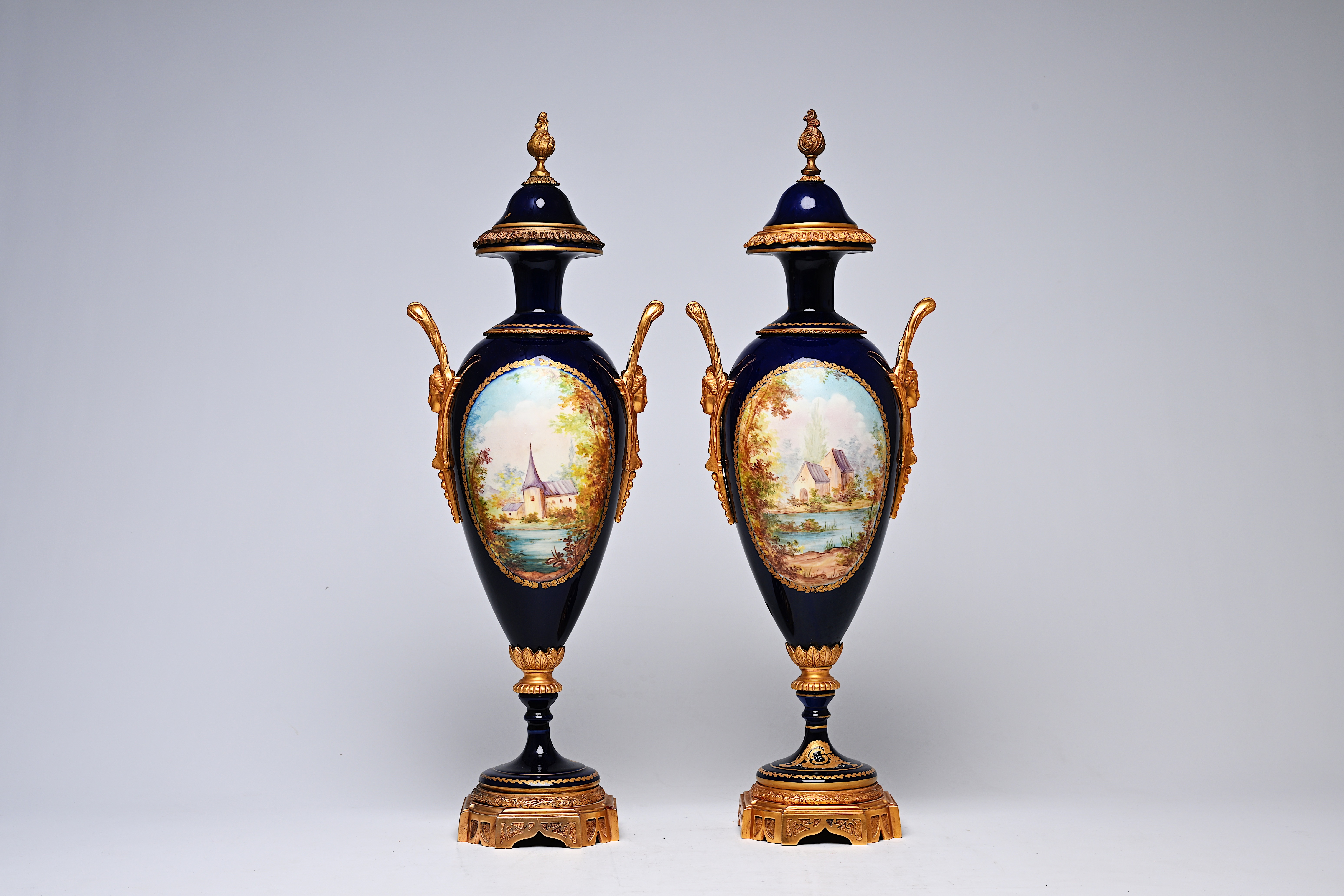 A pair of French gilt bronze mounted gold layered blue ground Sevres style vases and covers with lan - Image 3 of 9