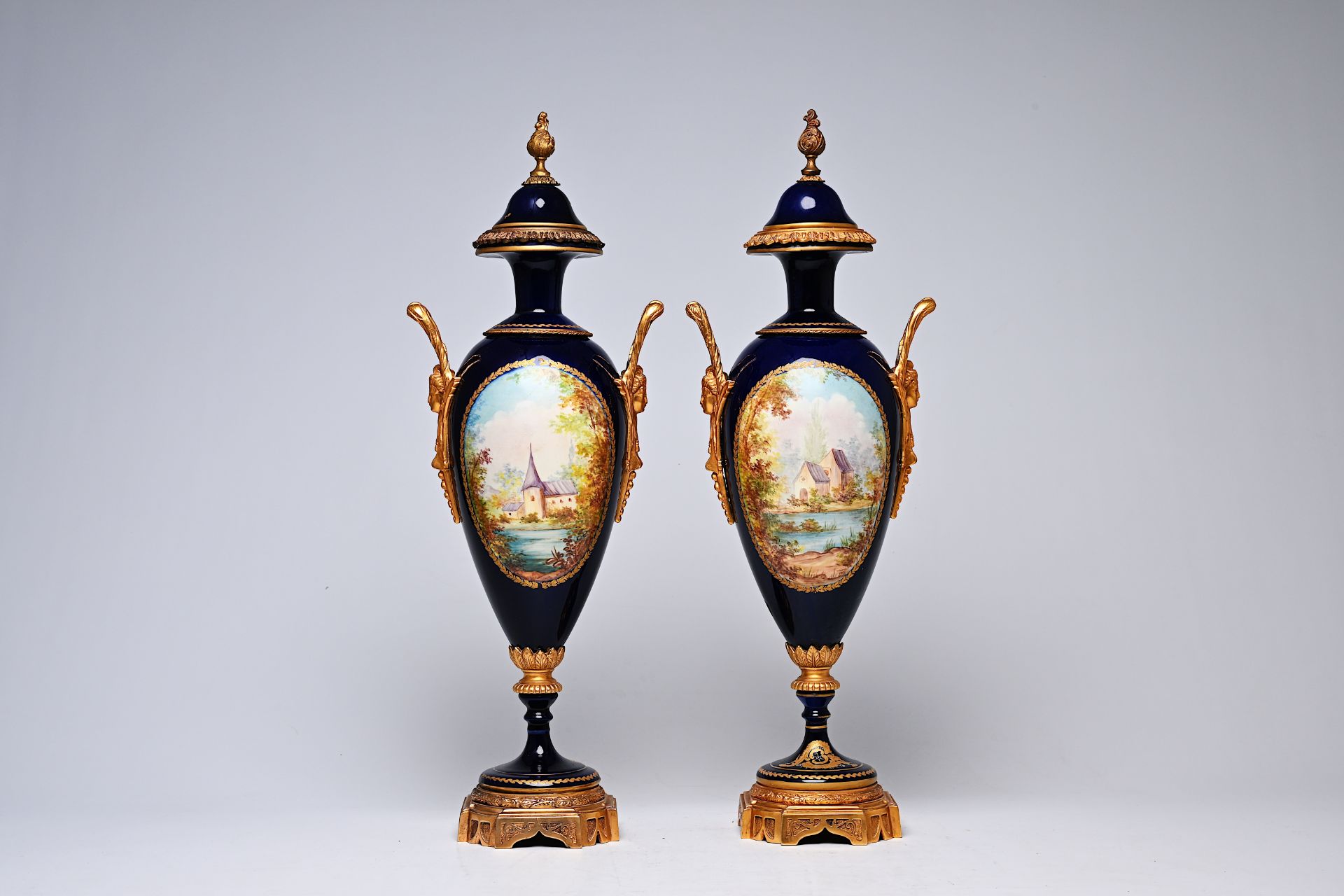 A pair of French gilt bronze mounted gold layered blue ground Sevres style vases and covers with lan - Image 3 of 9