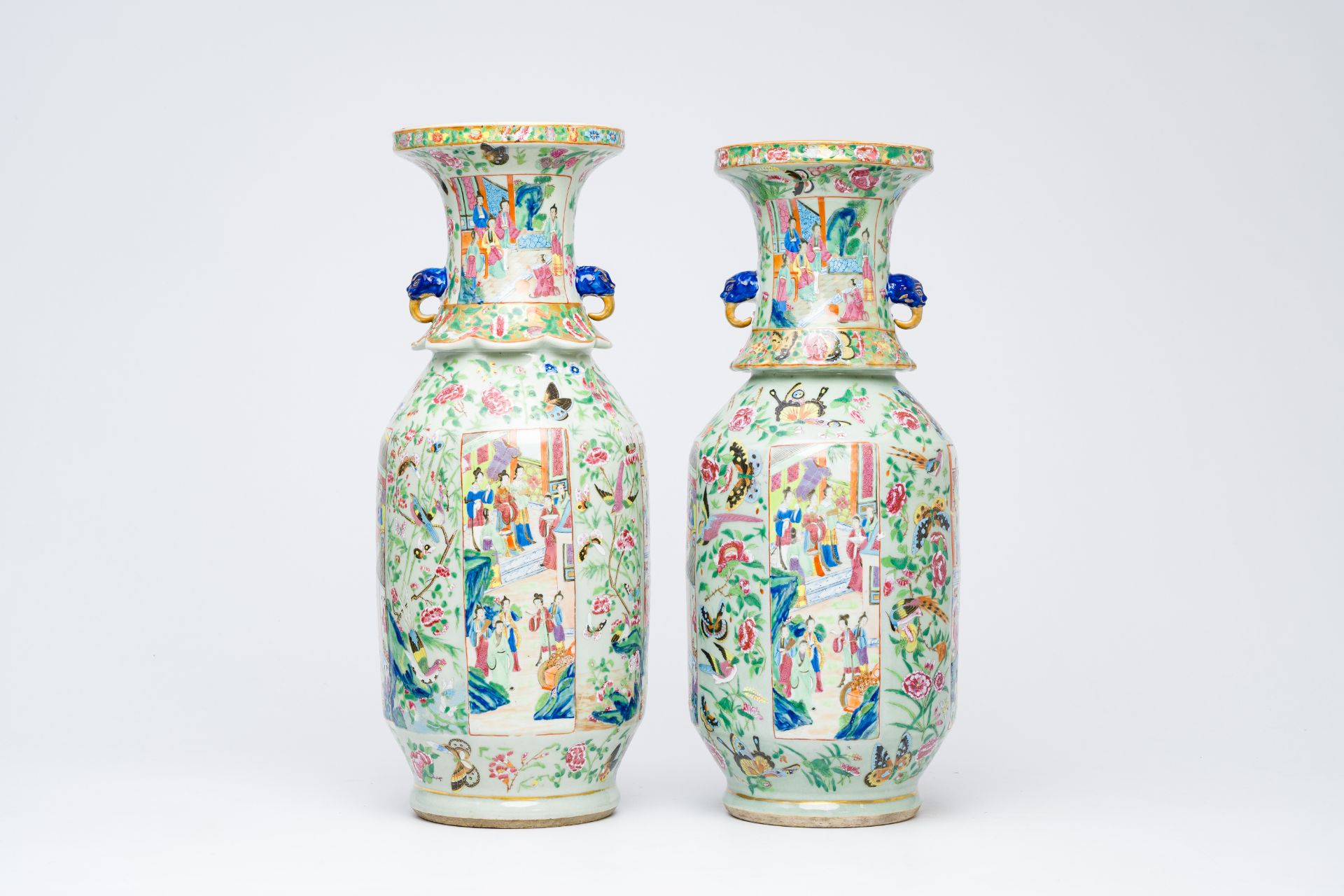 Two Chinese Canton famille rose celadon ground vases with palace scenes and birds and butterflies am