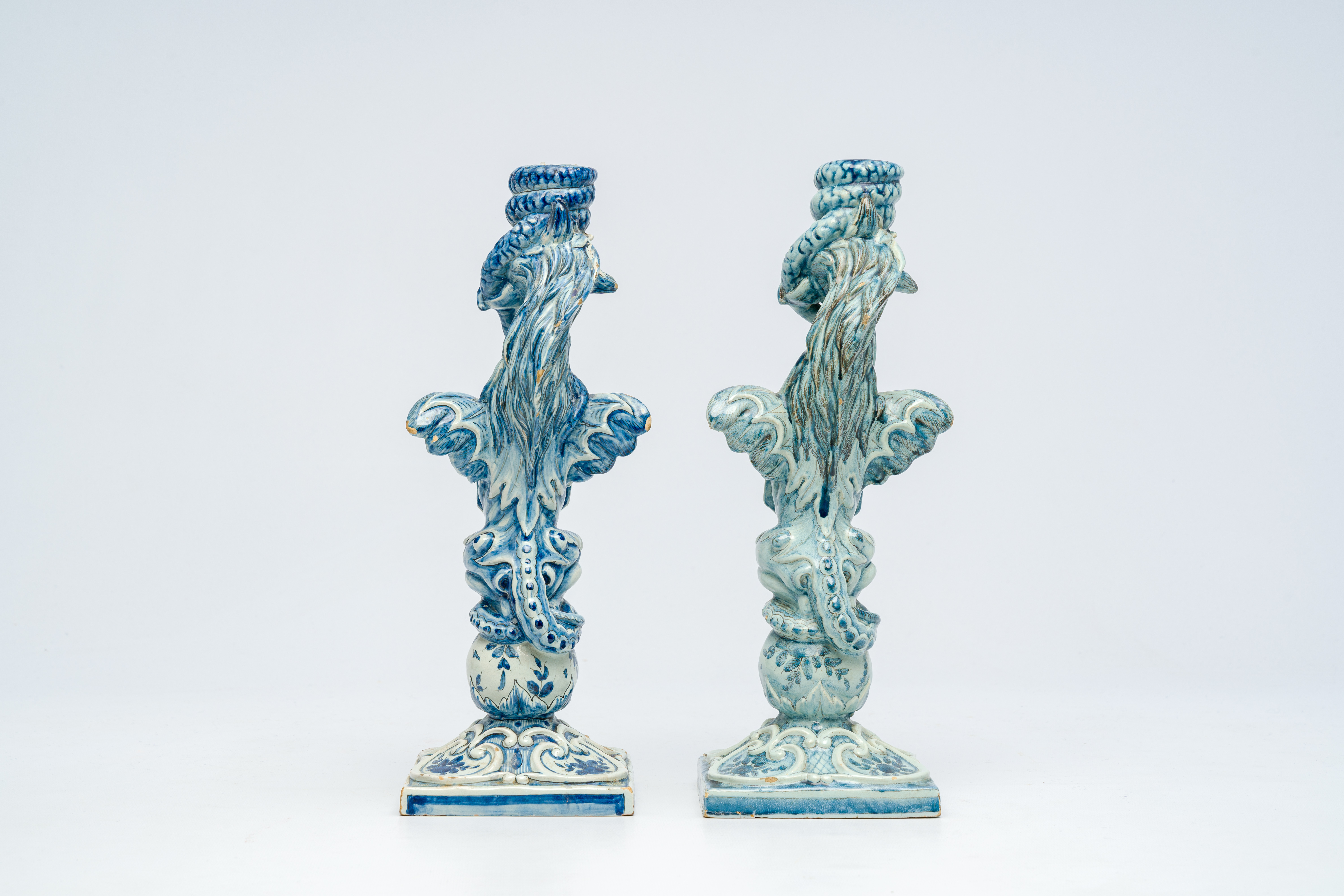 A pair of blue and white Italian pottery 'griffin' candlesticks, Cantagalli, late 19th C. - Image 4 of 7