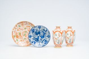 A Japanese blue and white Arita dish, a Samson Imari style dish and a pair of Kakiemon style vases,