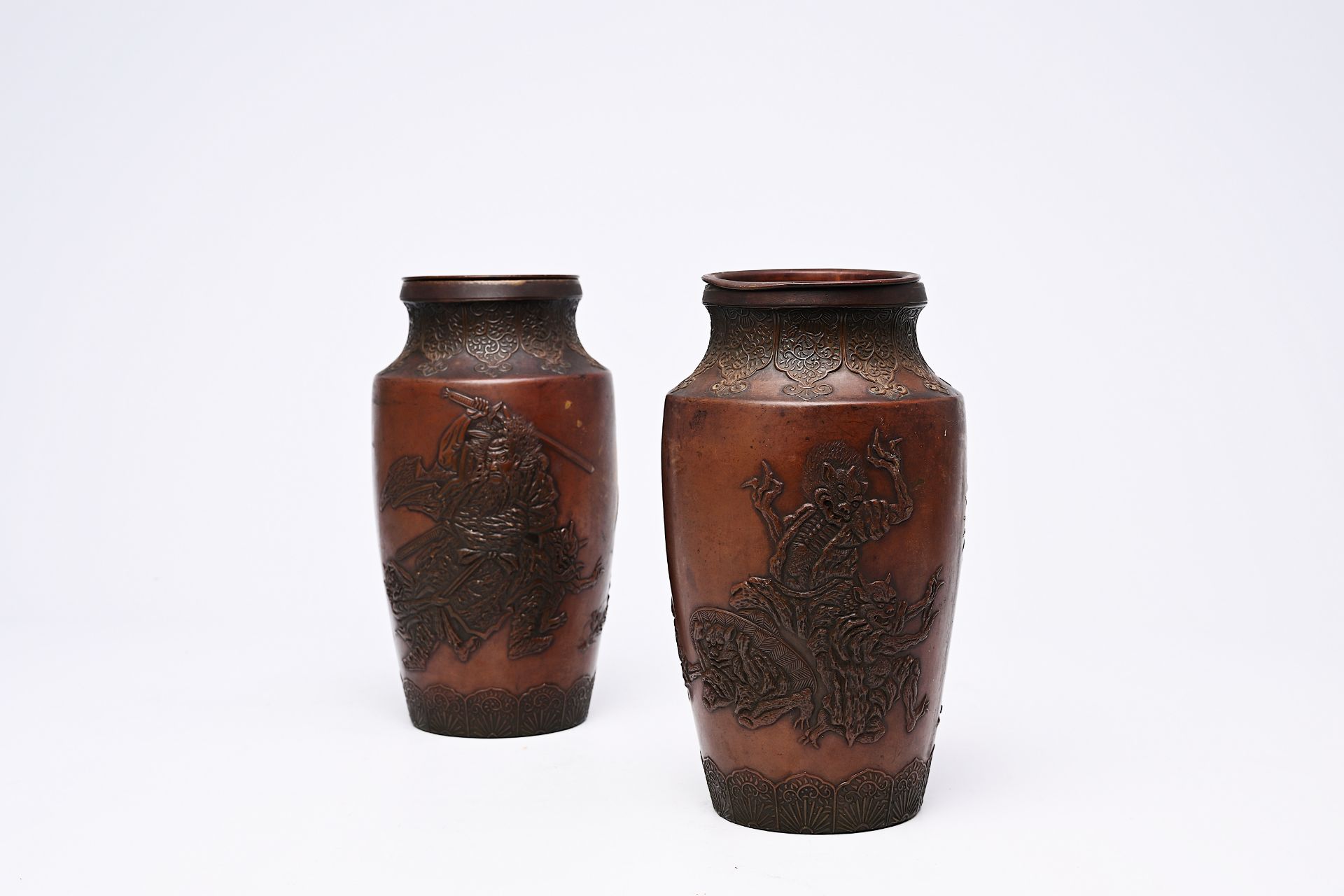 A pair of Japanese bronze vases with relief design of demons in a landscape, Meiji, 19th/20th C. - Image 7 of 7