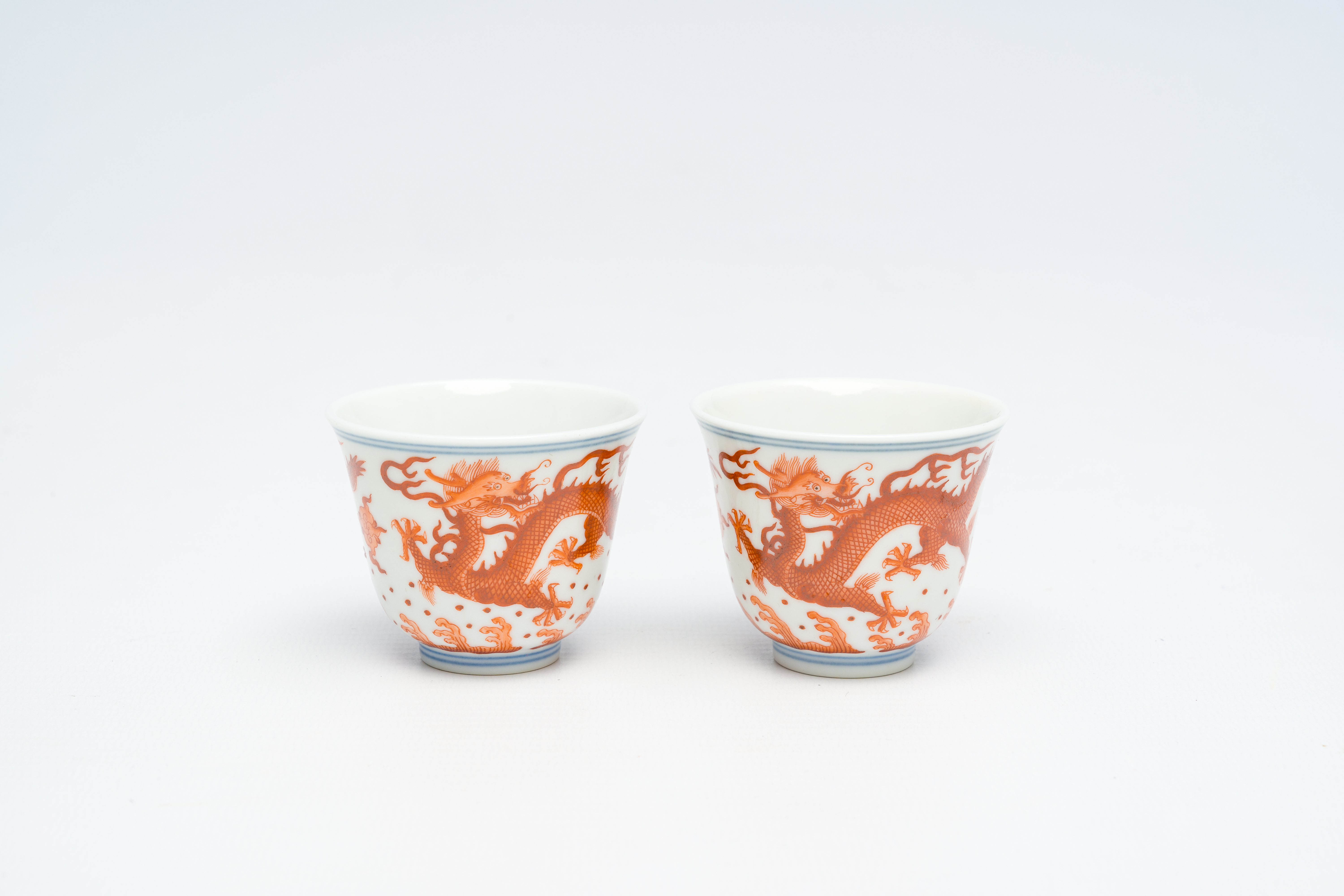 A pair of Chinese blue, white and iron-red 'dragons chasing the pearl' cups, Guangxu mark, 19th/20th - Image 2 of 14
