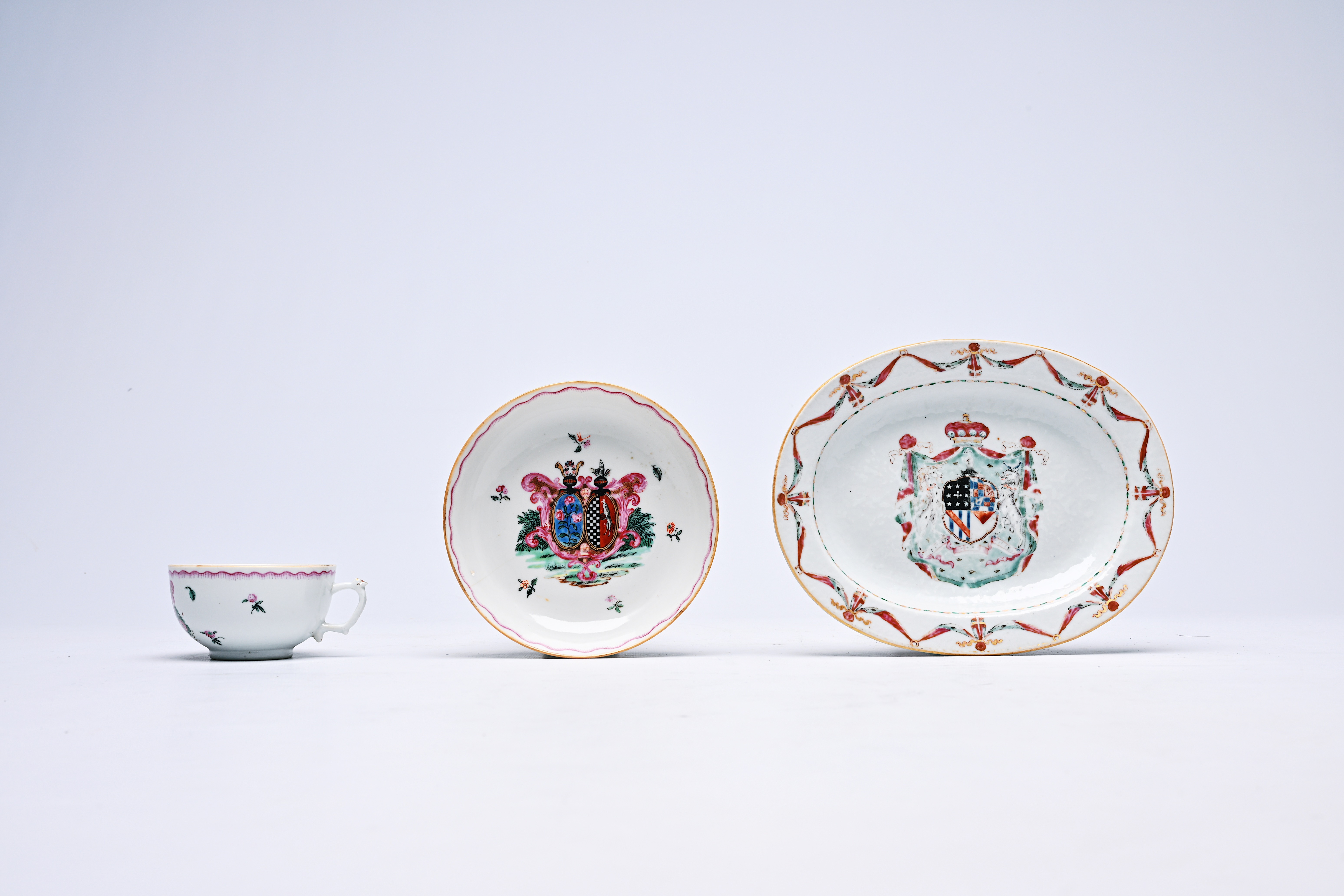 A Chinese famille rose armorial oval dish and a cup and saucer, Qianlong - Image 4 of 5