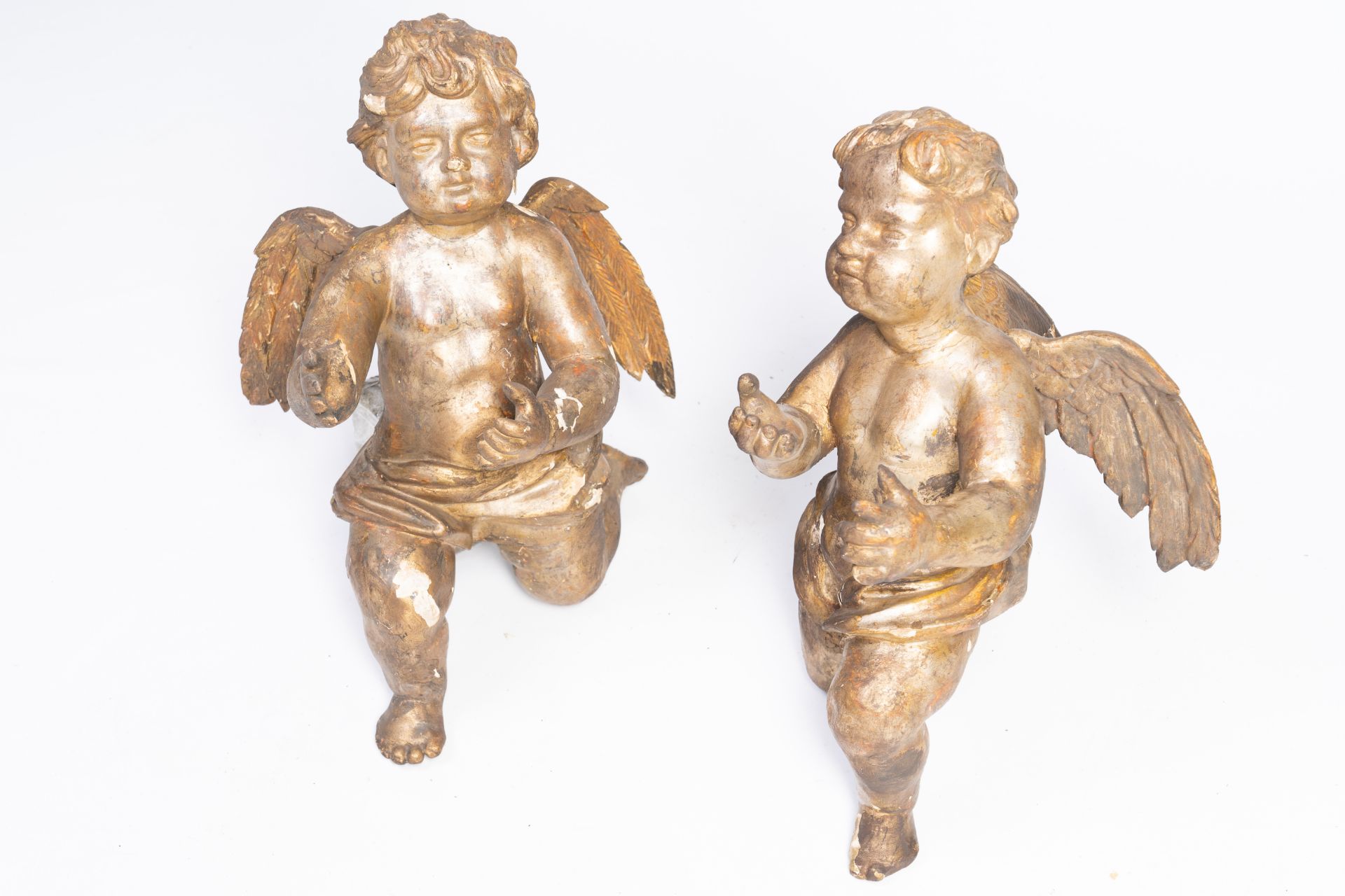 A pair of large gilded wood sculptures of angels, probably Flanders, first half 18th C.