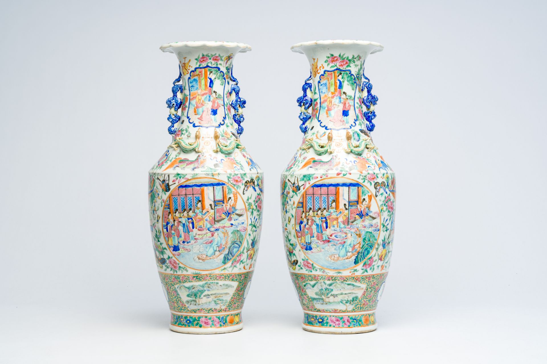 A pair of Chinese Canton famille rose vases with palace scenes, auspicious symbols and mythical anim - Image 3 of 6