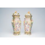 A pair of fine quadrangular Chinese Canton famille rose vases and covers with palace scenes and figu