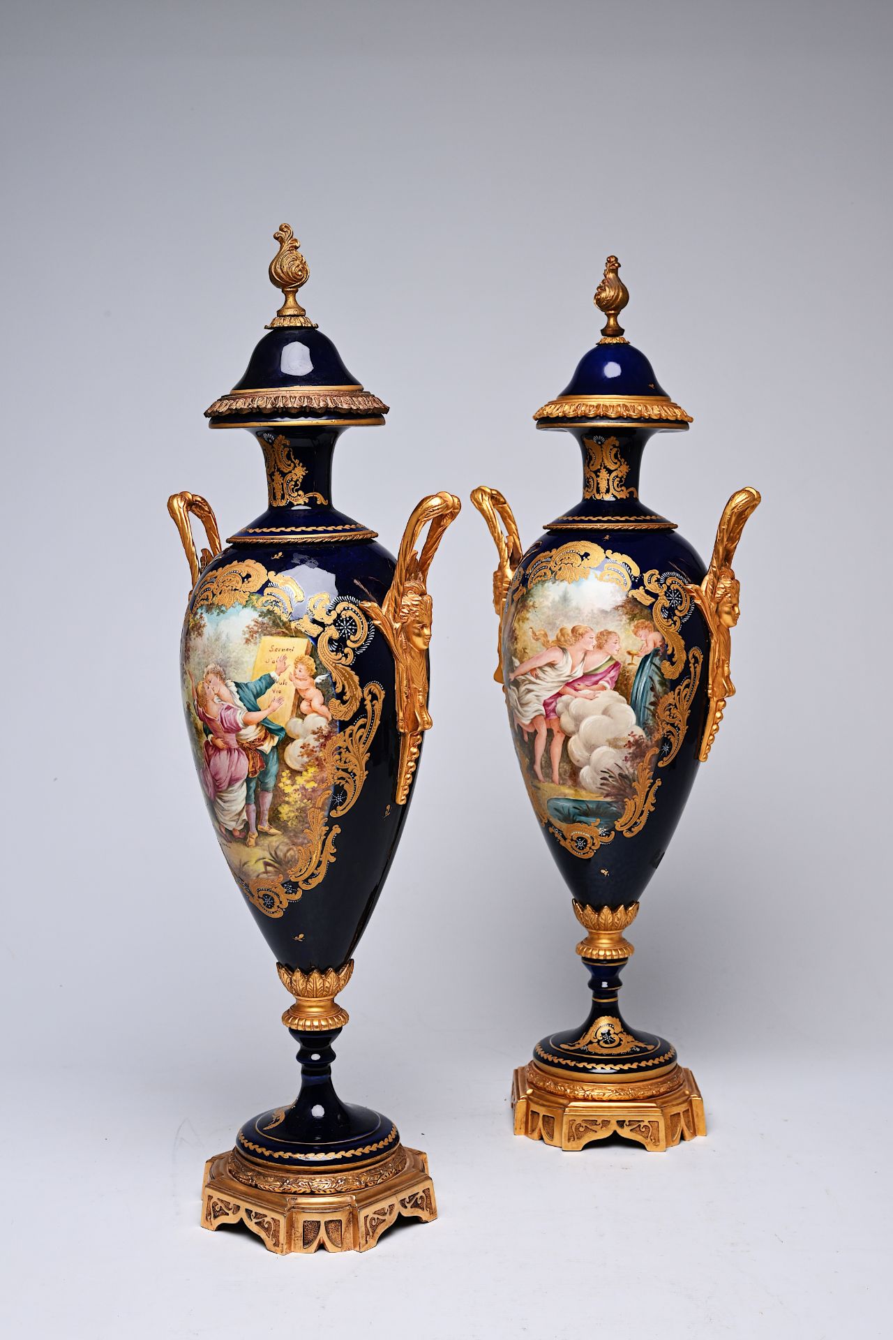A pair of French gilt bronze mounted gold layered blue ground Sevres style vases and covers with lan - Image 9 of 9