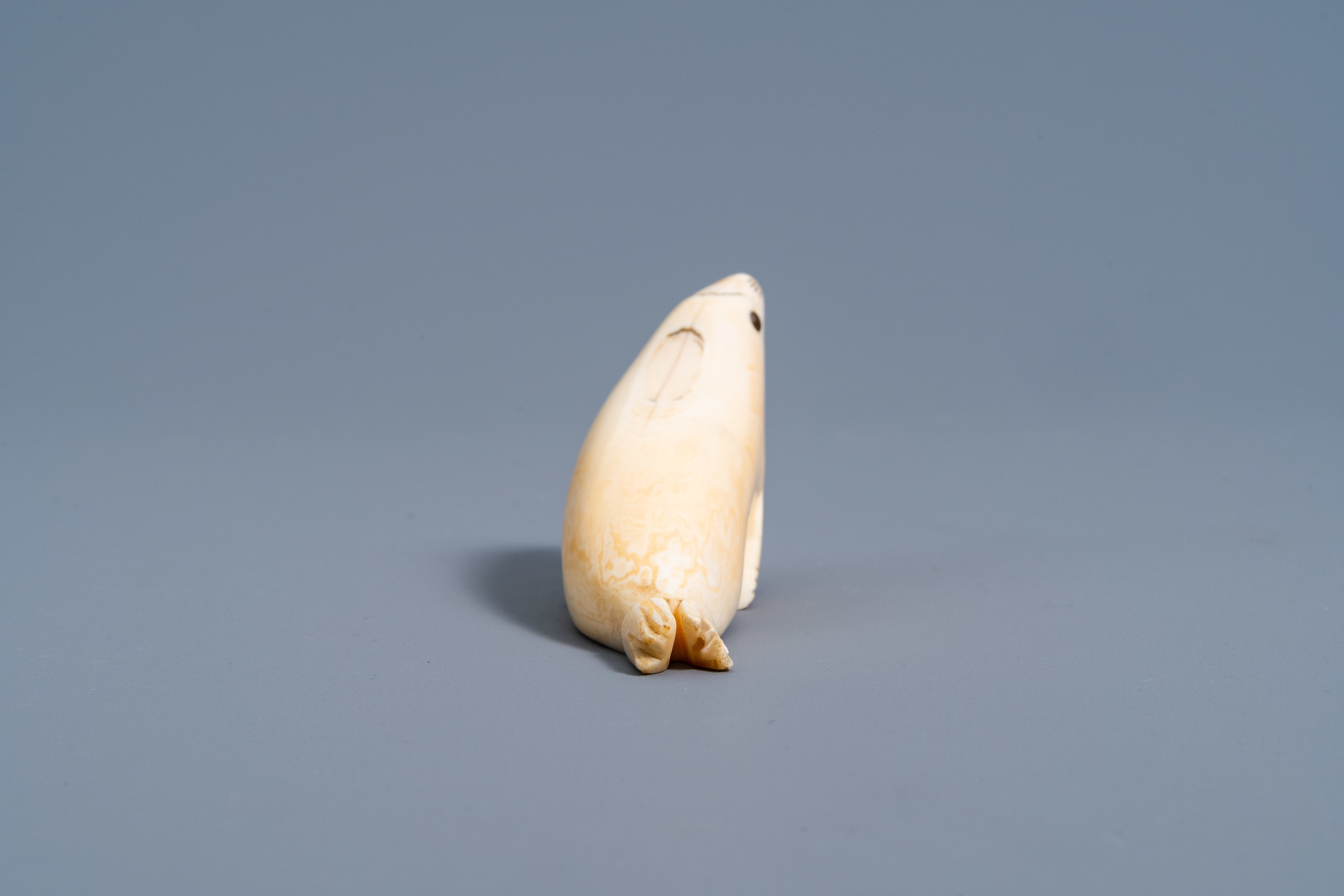 An Inuit carved whale ivory figure of a seal, Canada or Alaska, 19th C. - Image 6 of 11
