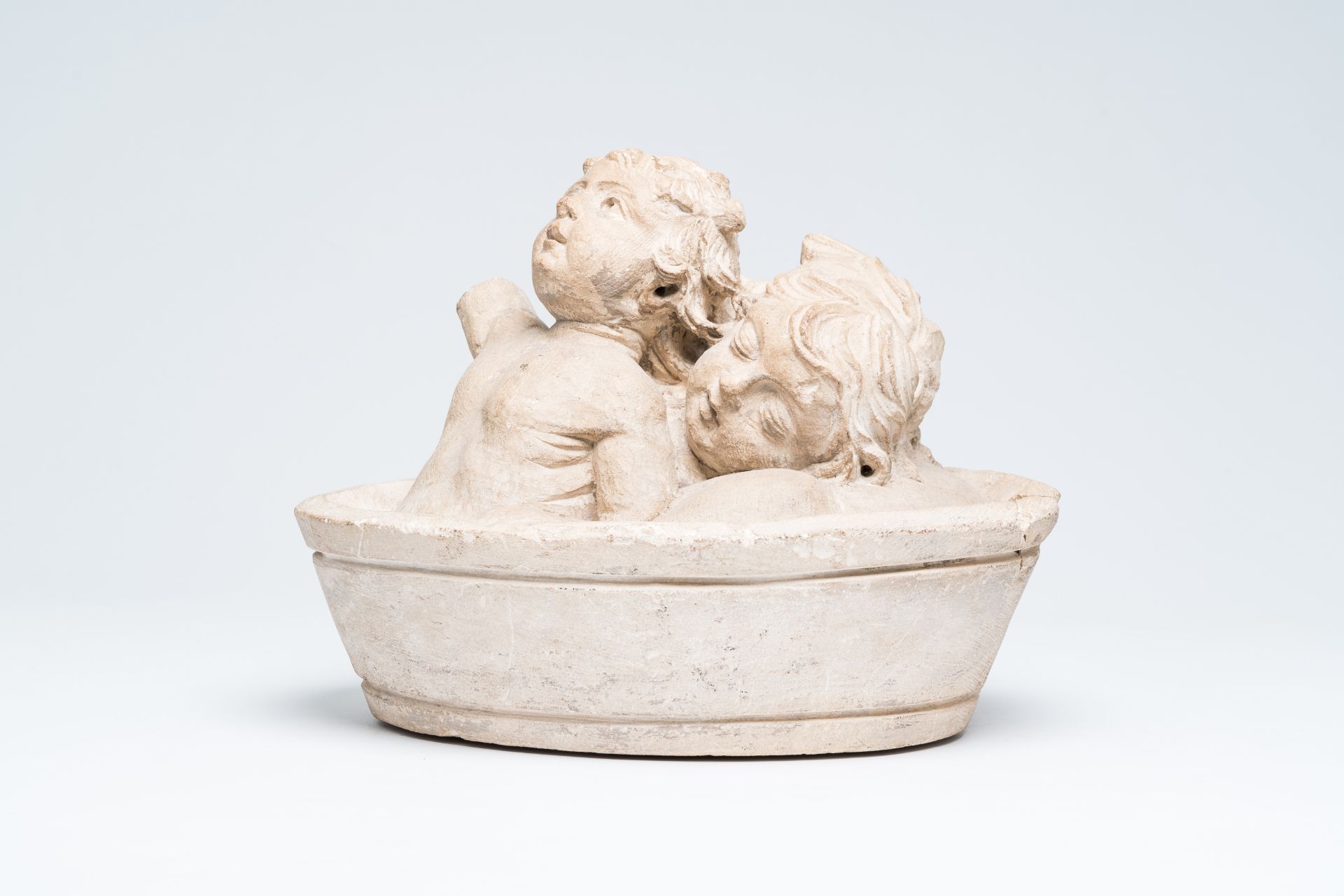 A French limestone group depicting the three Saint Nicholas children in a tub, 16th C. - Image 3 of 8