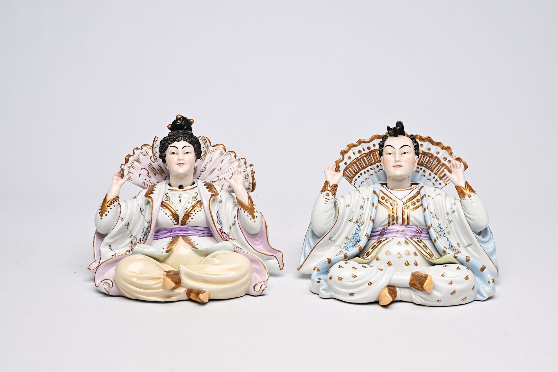 A pair of polychrome decorated Scheibe-Alsbach porcelain nodding-head mandarin figures, Kister mark,