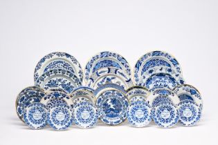 Twenty-six Dutch Delft blue and white dishes and plates, 18th C.