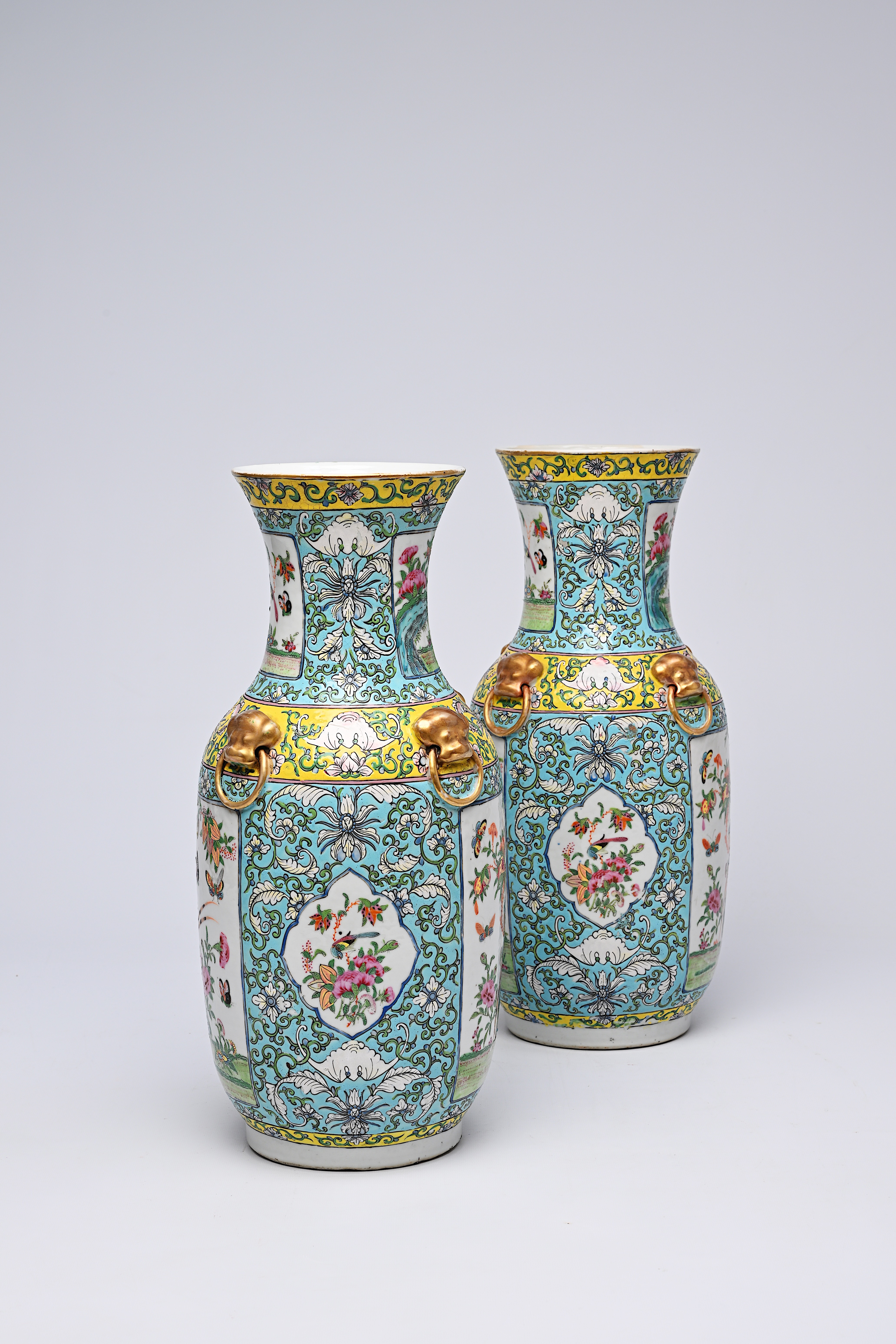A pair of Chinese Canton famille rose turquoise ground vases with birds and butterflies among blosso - Image 10 of 13