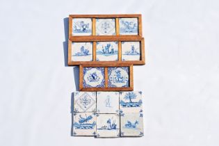 Fourteen various Dutch Delft blue and white tiles, 17th/18th C.