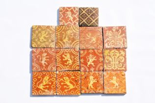 Fourteen Flemish decorated redware tiles in medieval style, 18th/19th C.