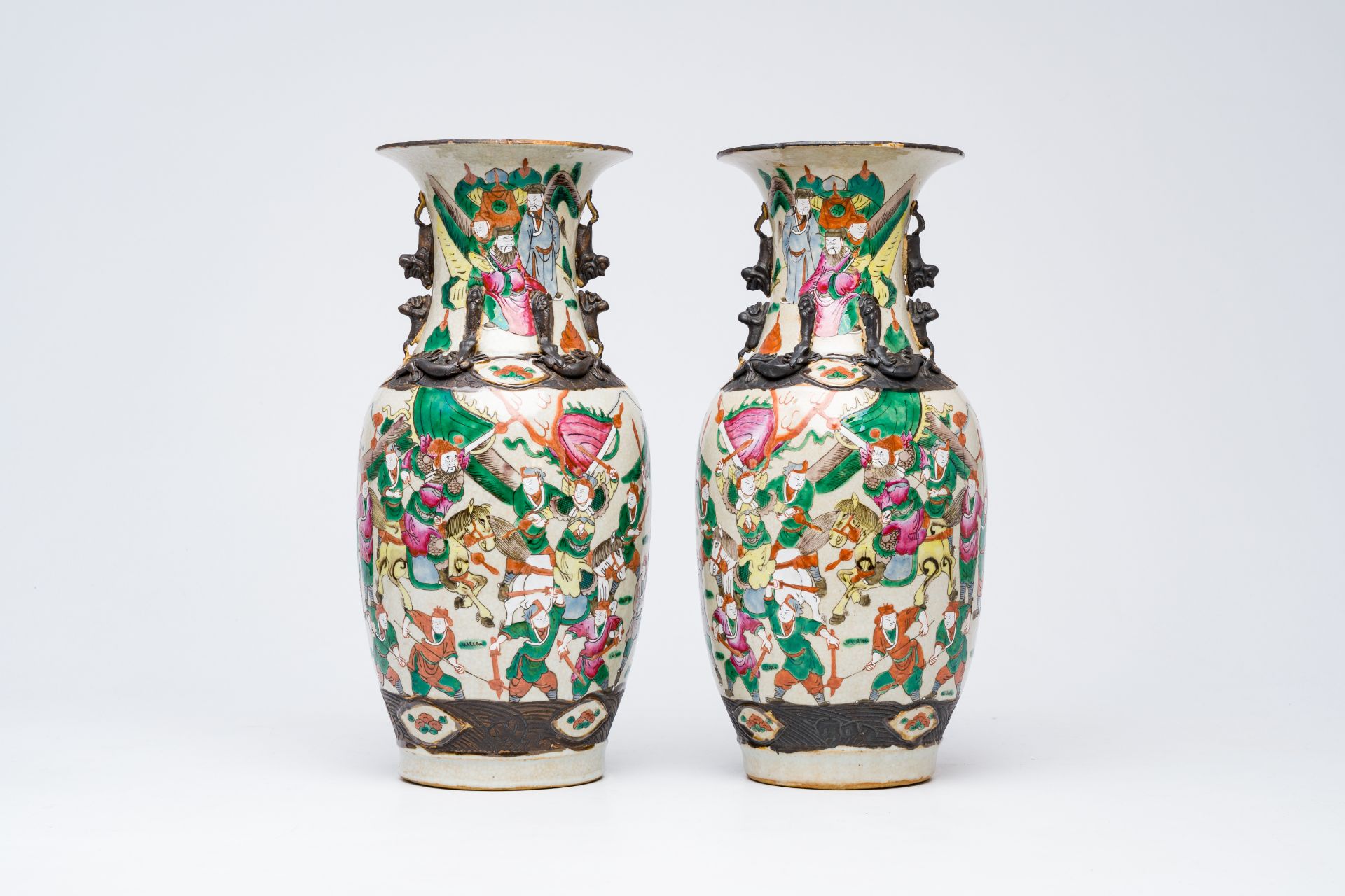 A pair of Chinese Nanking crackle glazed famille rose 'warrior' vases, 19th C.