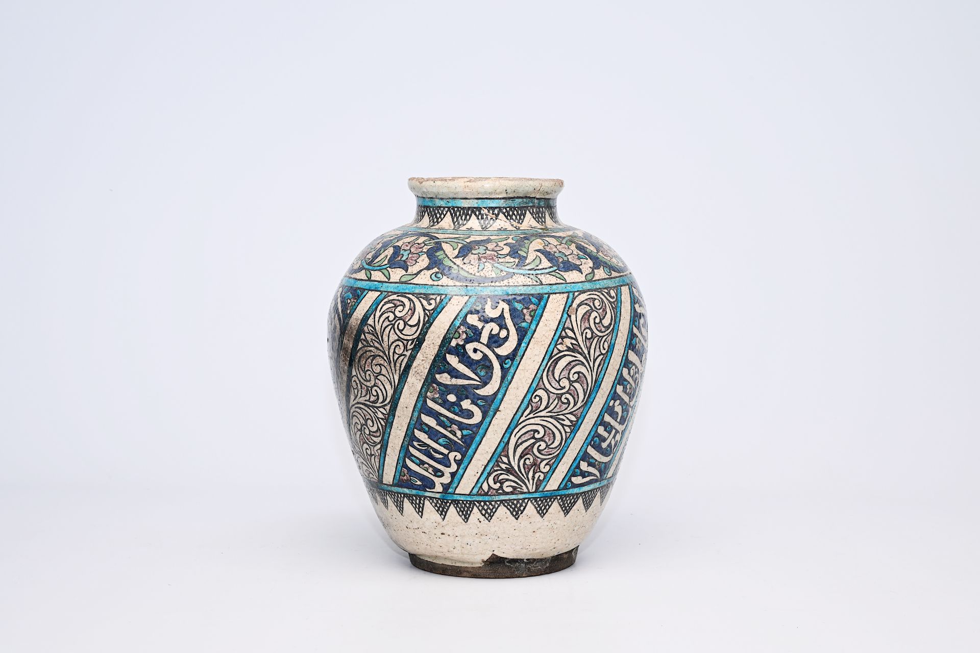 A polychrome pottery jar with floral and calligraphic design, Iran, 19th C. - Image 3 of 9