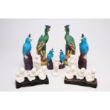 A pair of Chinese famille rose phoenixes, two pairs of turquoise parrots and nine blanc de Chine fig