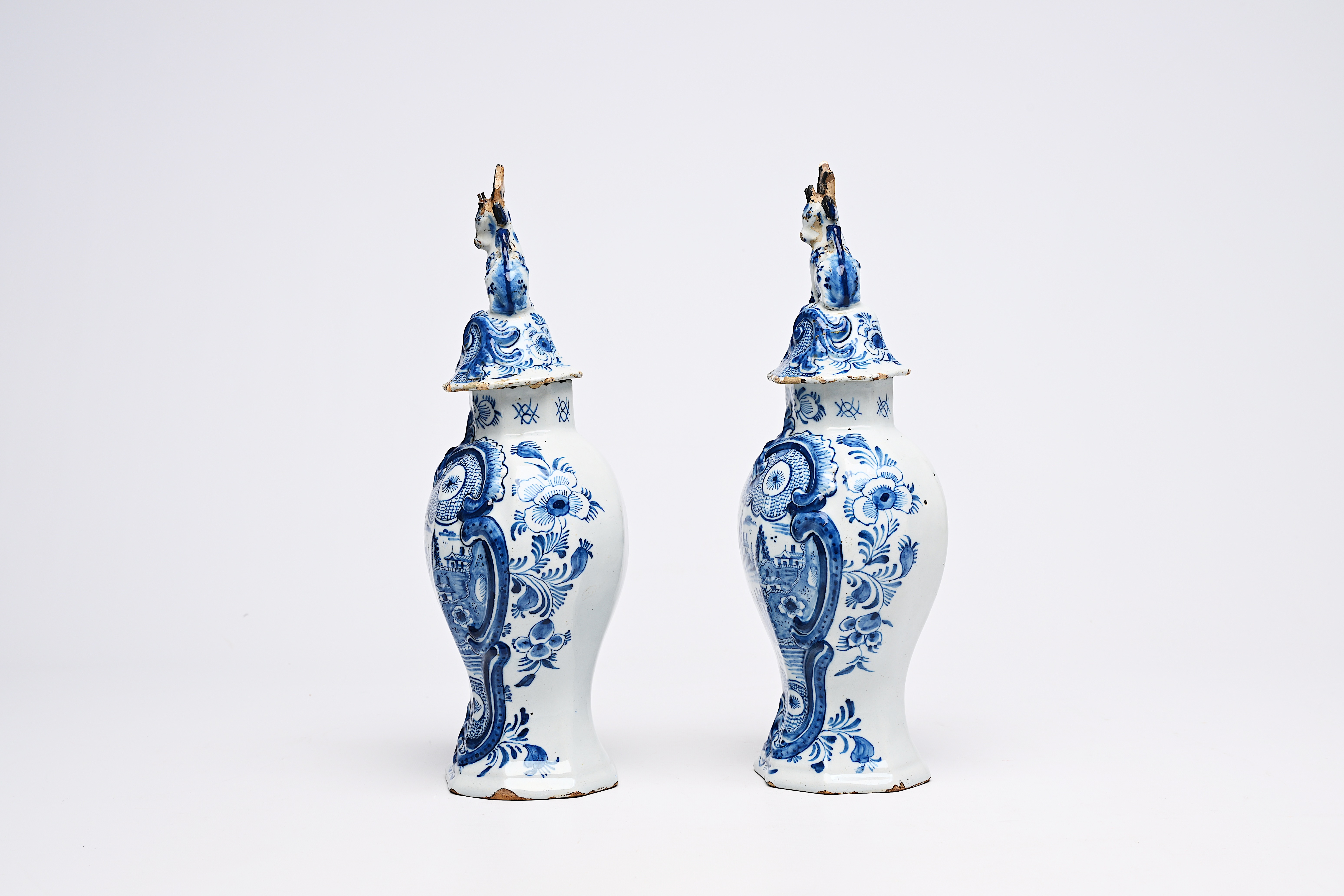 A pair of Dutch Delft blue and white vases and covers with landscapes and four various plates, 18th/ - Image 6 of 13