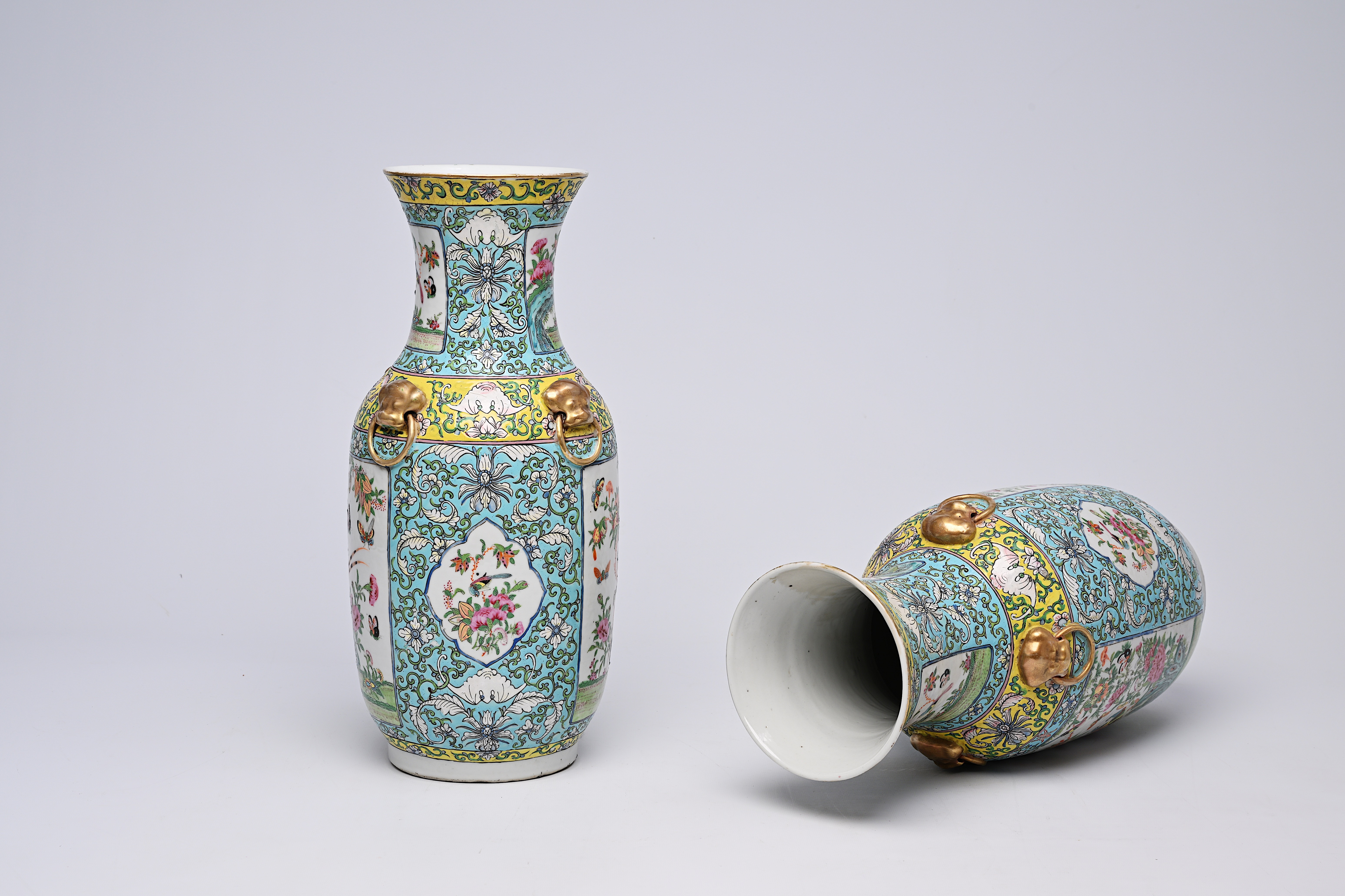 A pair of Chinese Canton famille rose turquoise ground vases with birds and butterflies among blosso - Image 11 of 13