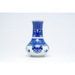 A Chinese peer-shaped blue and white 'taotie masks' vase, 20th C.