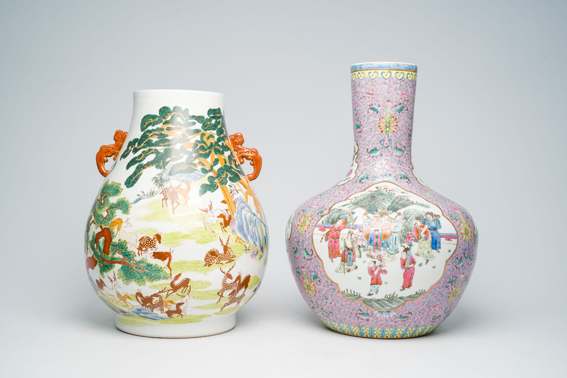 A Chinese famille rose tianqiu ping vase with Immortals and their servants in a landscape and a fami