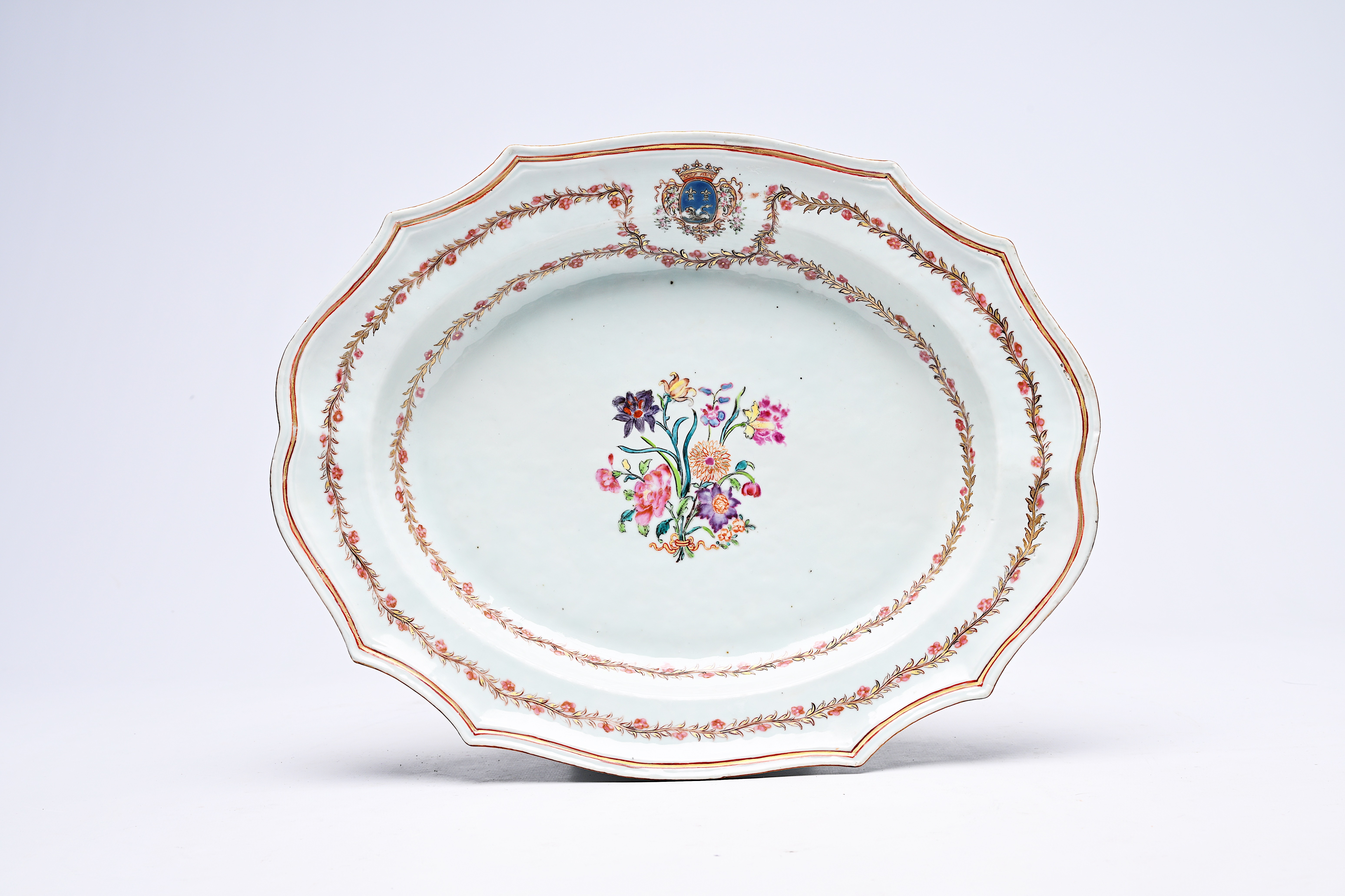 A Chinese famille rose armorial charger with fine floral design for the French market, Qianlong