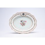 A Chinese famille rose armorial charger with fine floral design for the French market, Qianlong