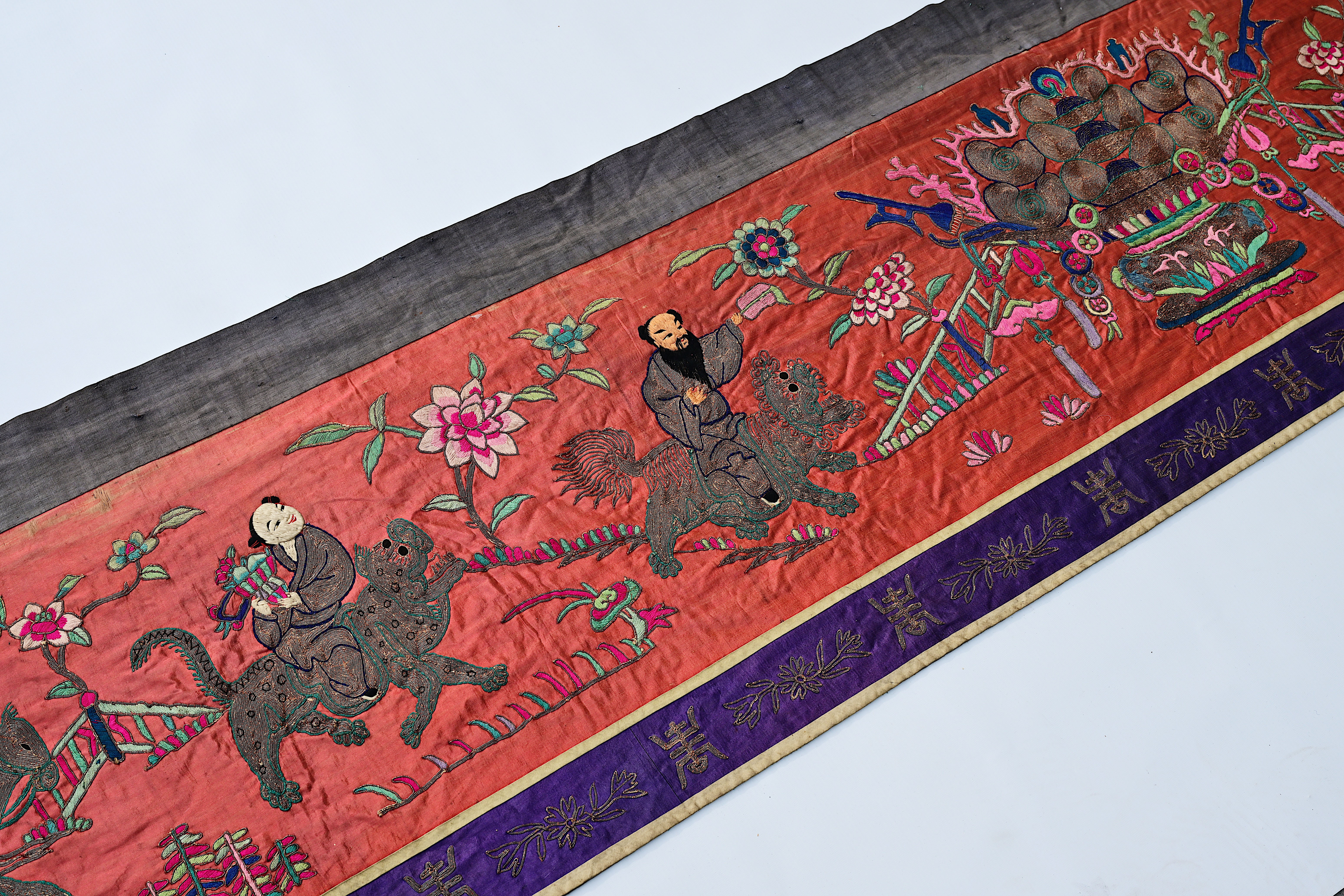 A long Chinese horizontal silk embroidered 'Eight Immortals' altar cloth with silver thread, 19th C.