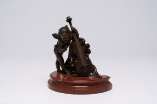 French school: An angel playing a double bass, brown patinated bronze on a red marble base, 19th/20t