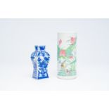 A Chinese famille rose 'mandarin ducks' hat stand and a blue and white vase with floral design, 19th