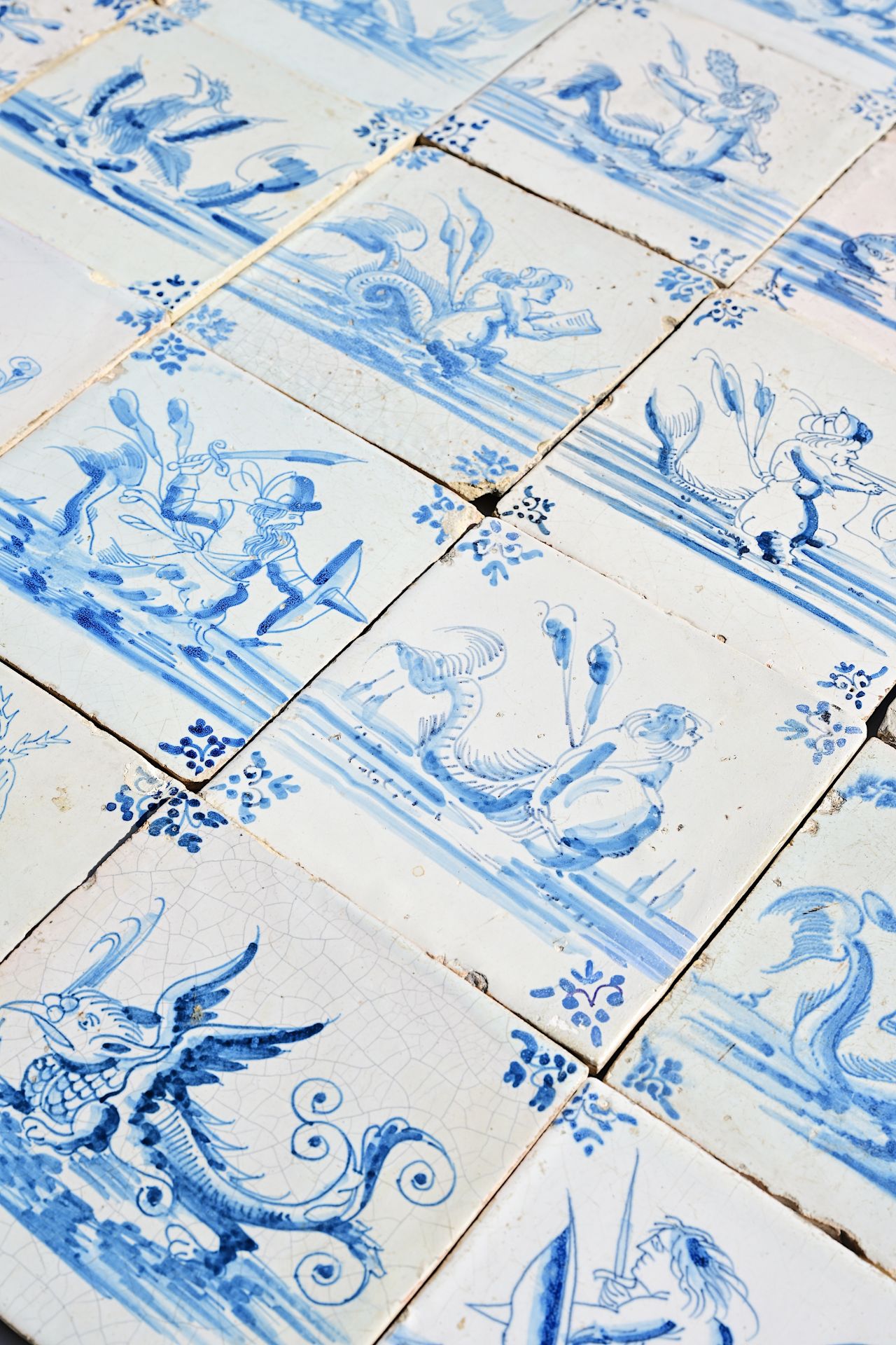Thirty Dutch Delft blue and white 'sea monster' tiles, 17th C. - Image 3 of 3