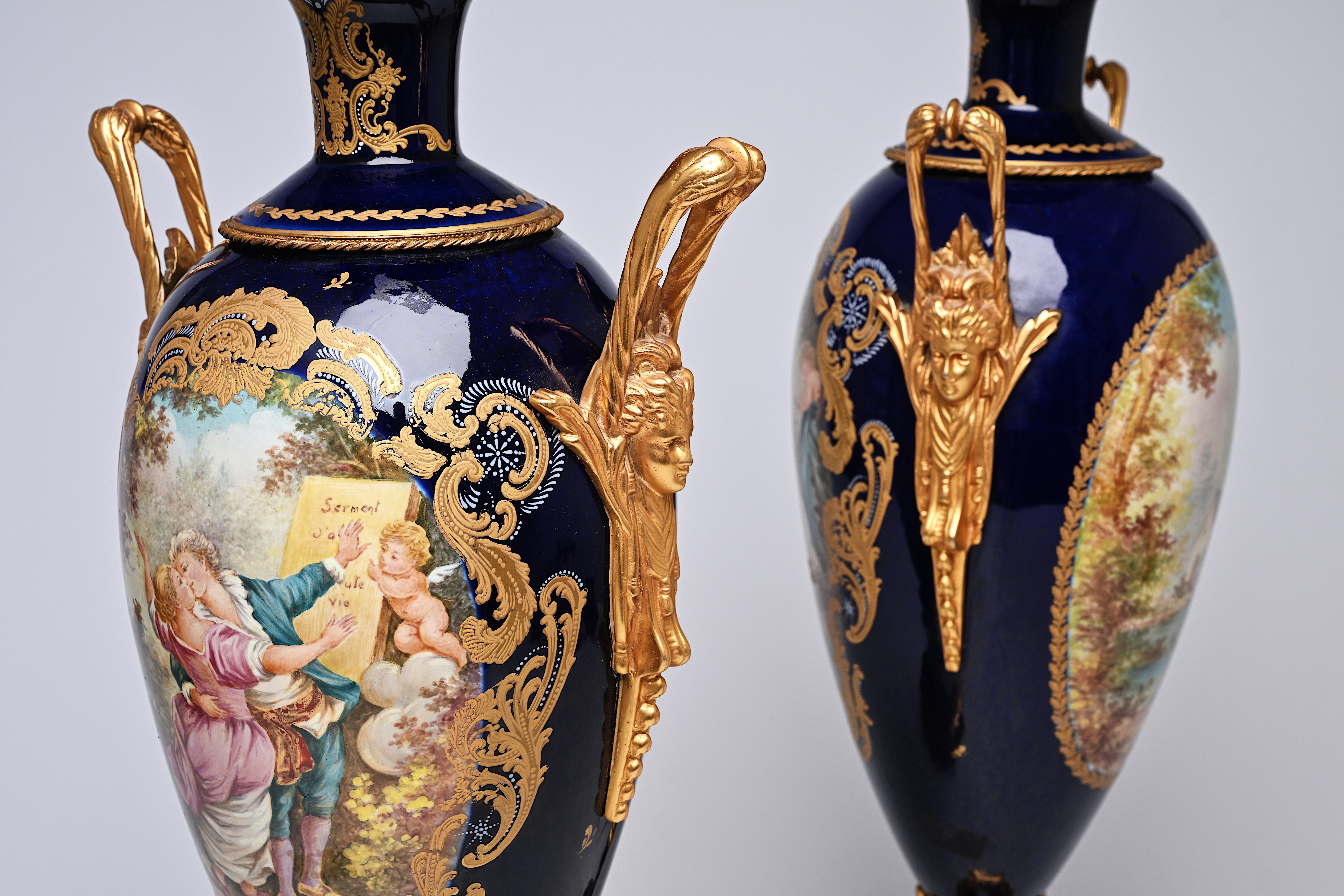 A pair of French gilt bronze mounted gold layered blue ground Sevres style vases and covers with lan - Image 8 of 9