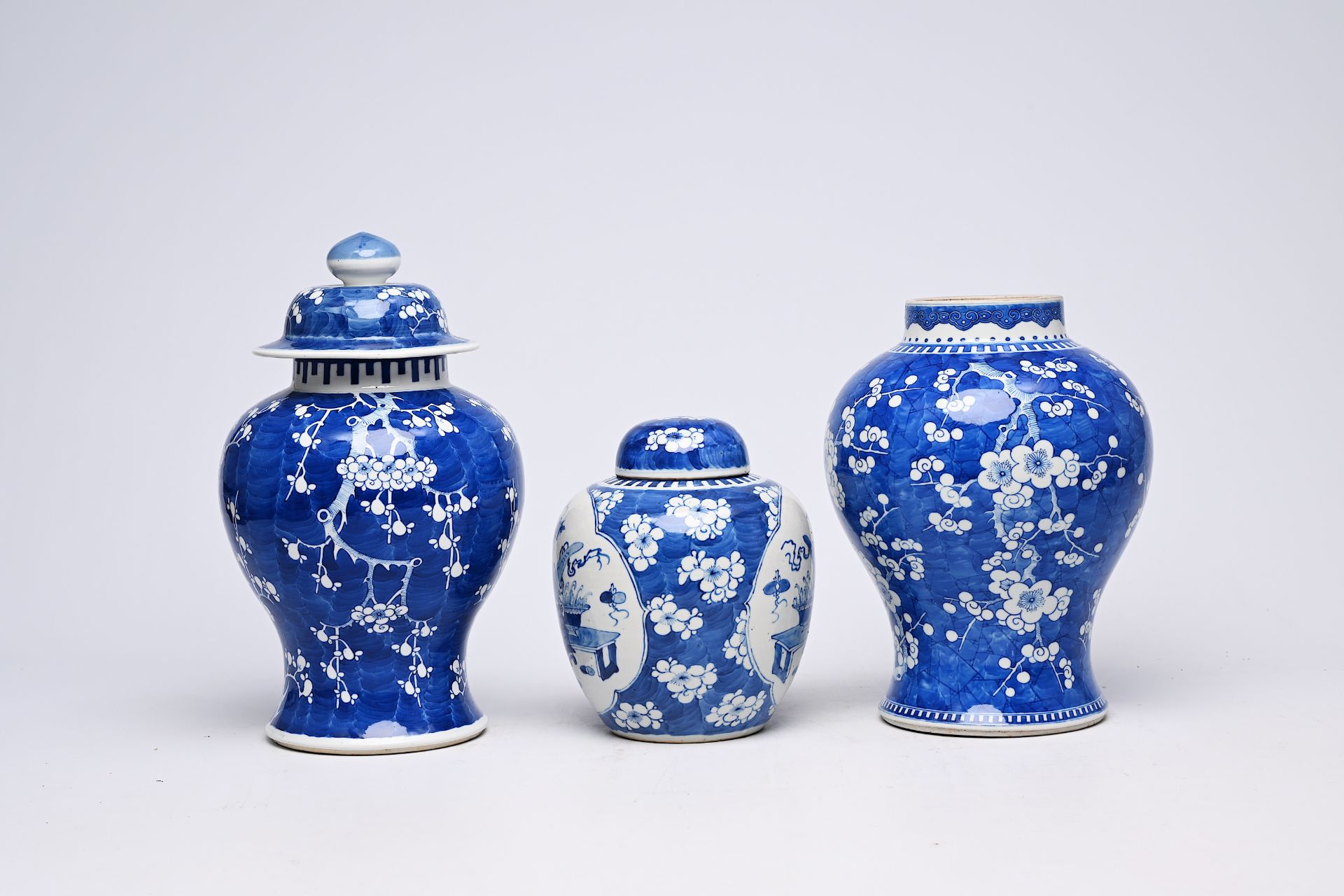 Two Chinese blue and white prunus on cracked ice ground vases and a jar and cover with antiquities, - Image 6 of 16