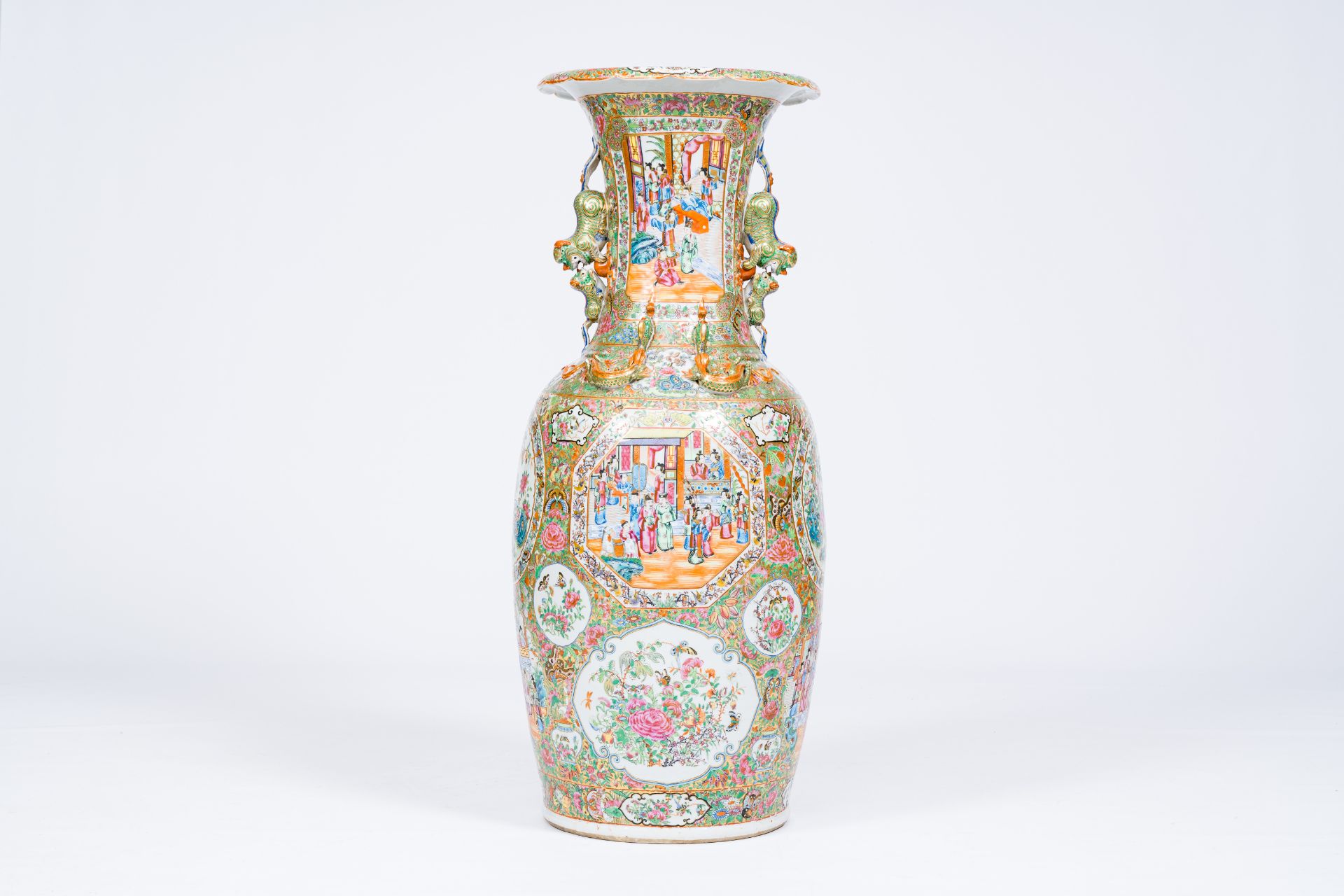 A large and fine Chinese Canton famille rose vase with palace scenes, birds and butterflies among bl