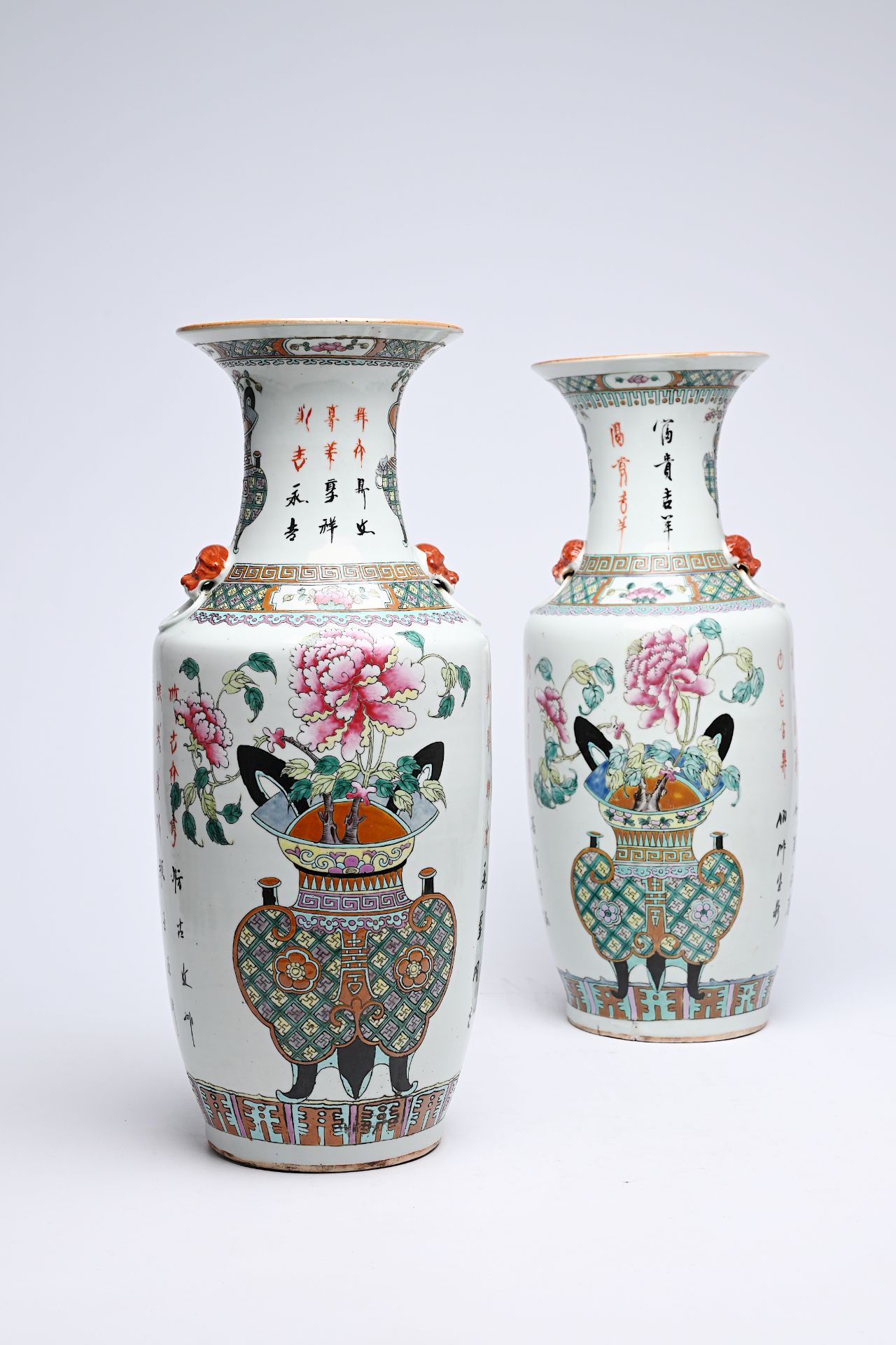 A pair of Chinese famille rose 'flower basket' vases, 19th C. - Image 5 of 12