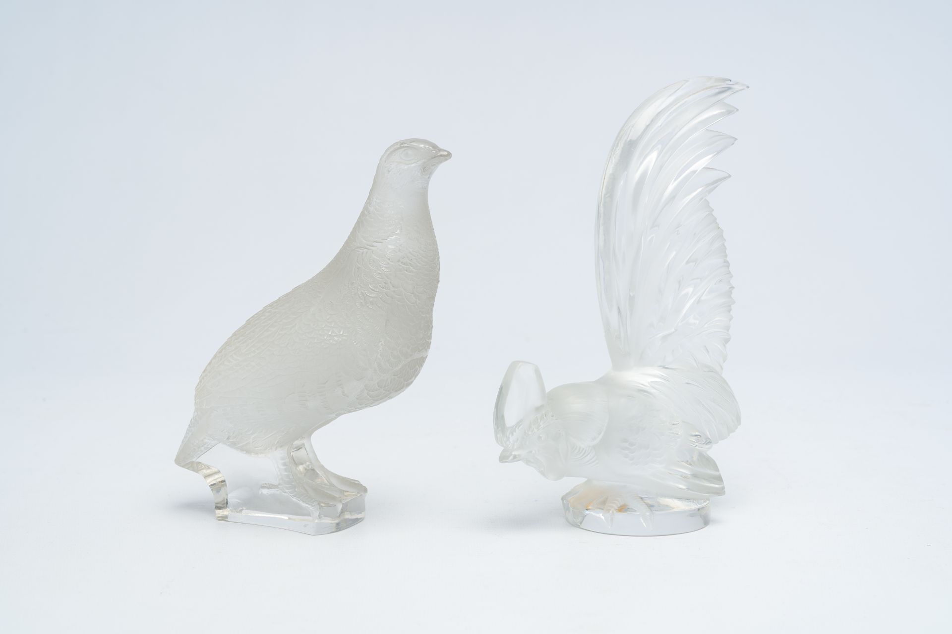 Two glass models of a rooster and a quail, marked Lalique France, 20th C.