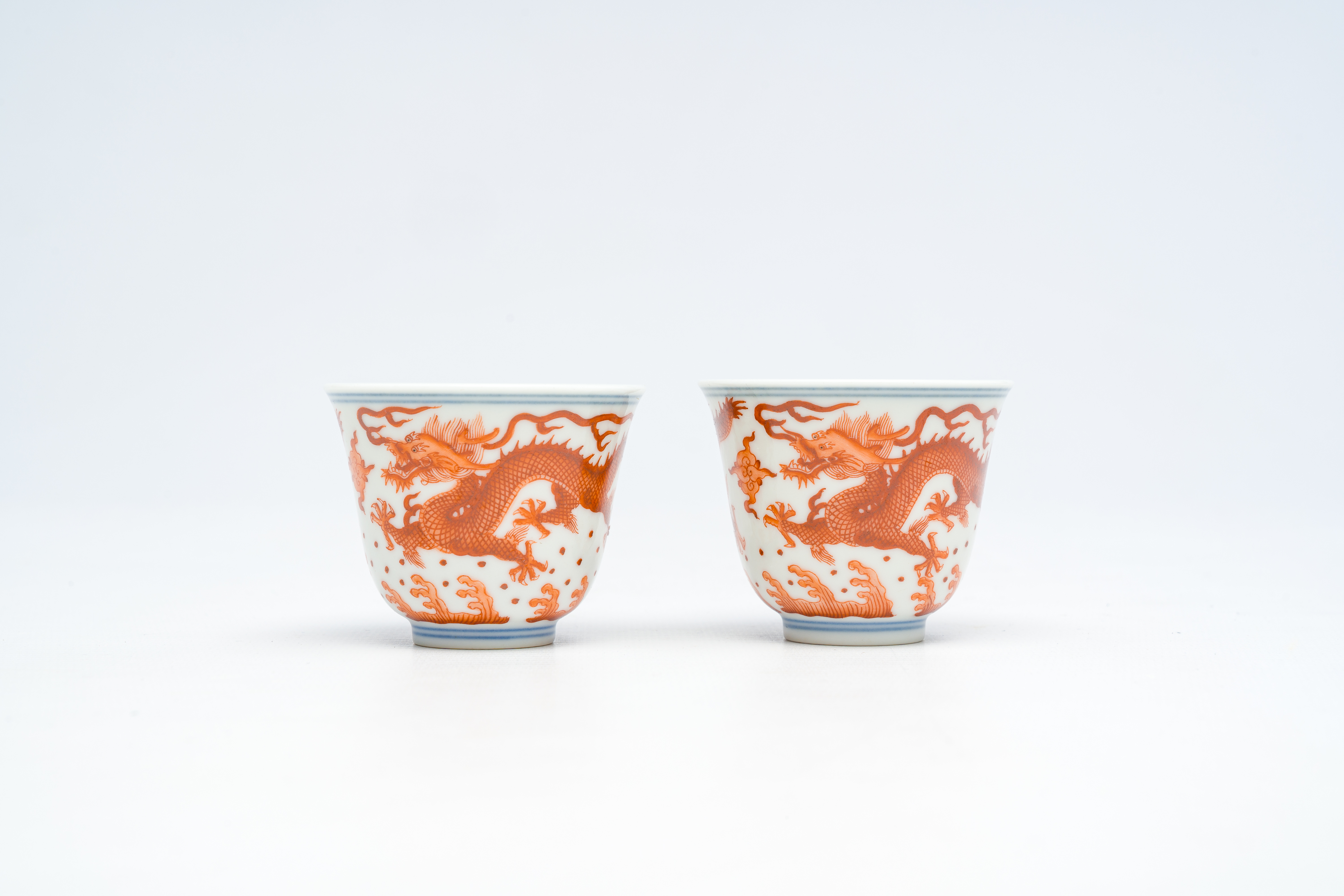 A pair of Chinese blue, white and iron-red 'dragons chasing the pearl' cups, Guangxu mark, 19th/20th - Image 9 of 14