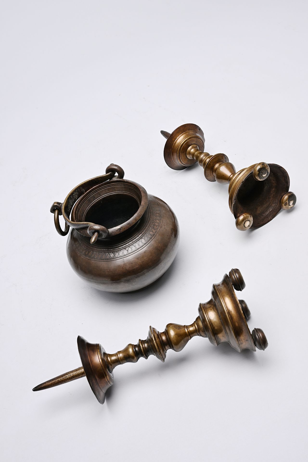 A pair of Italian bronze candlesticks and a holy water bucket, 16th/17th C. - Image 5 of 5