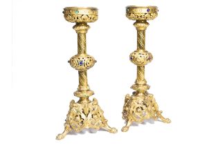 A pair of Belgian Gothic revival brass and bronze church candlesticks with cabochons and the motto '