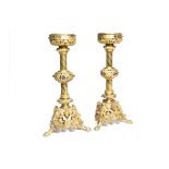 A pair of Belgian Gothic revival brass and bronze church candlesticks with cabochons and the motto '