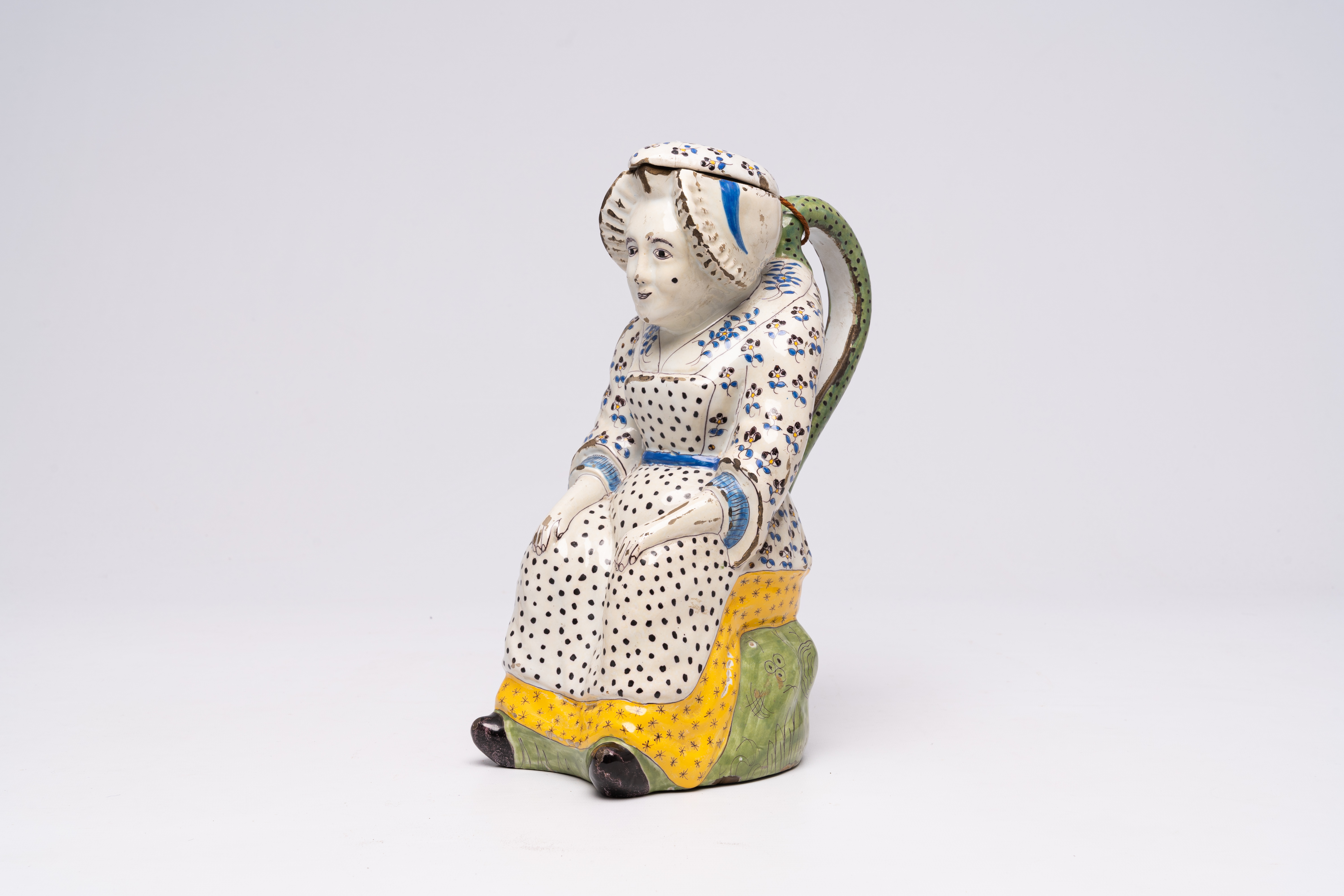 A large polychrome French faience 'Jacqueline' jug in the style of Lille, Desvres, 19th C. - Image 2 of 8