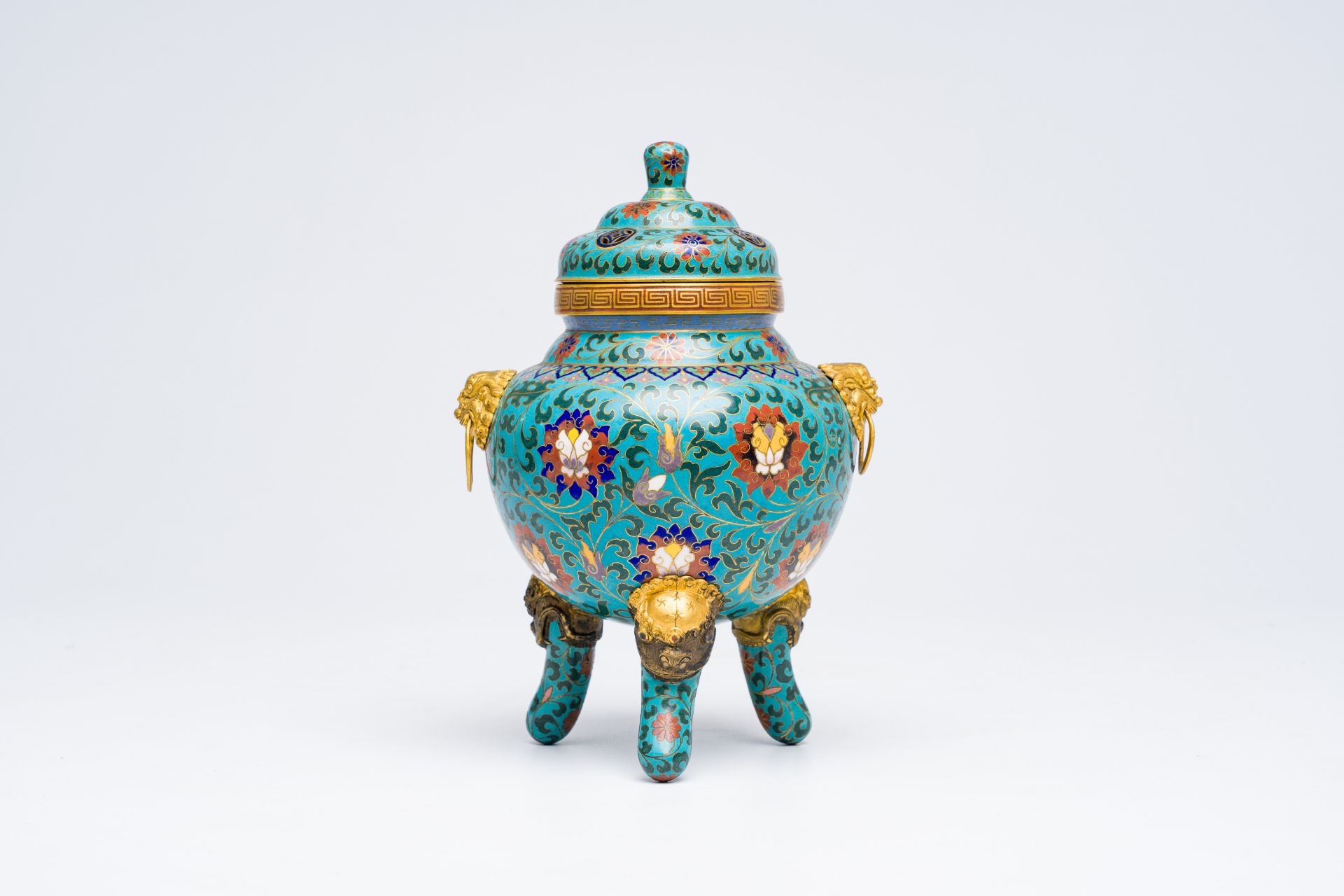 A Chinese cloisonne tripod censer with reticulated cover, 19th/20th C.