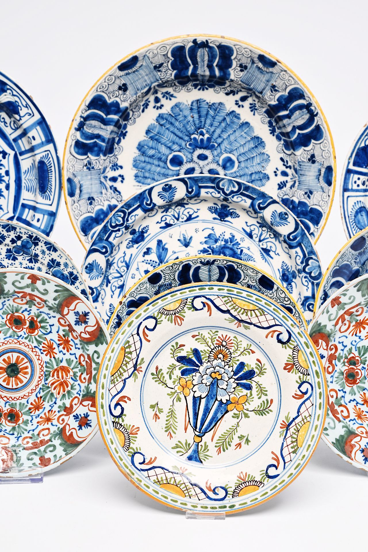 Twelve Dutch Delft blue and white and polychrome plates and dishes, 18th C. - Image 5 of 7
