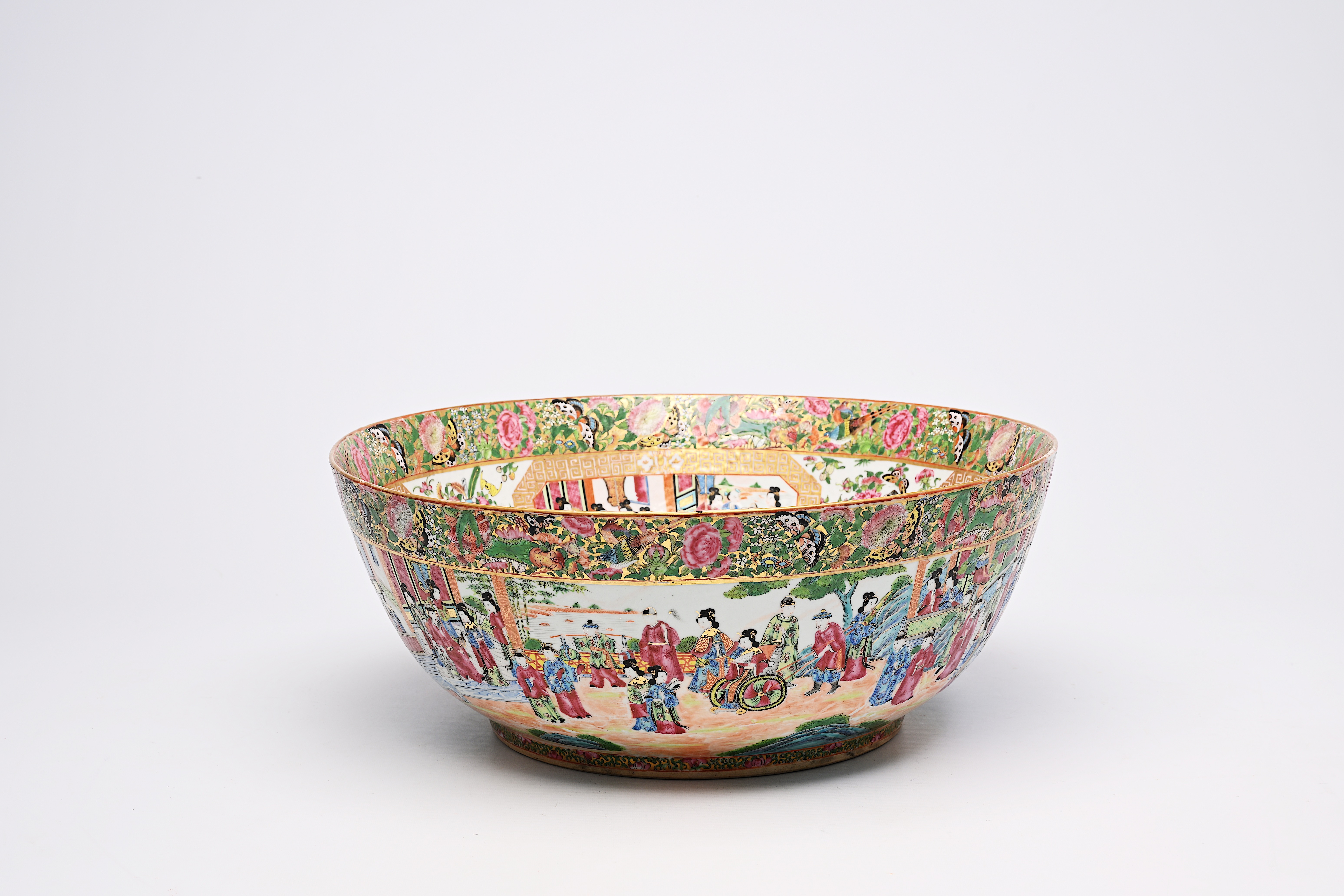 A large Chinese Canton famille rose bowl with floral design and palace scenes, 19th C. - Image 5 of 9