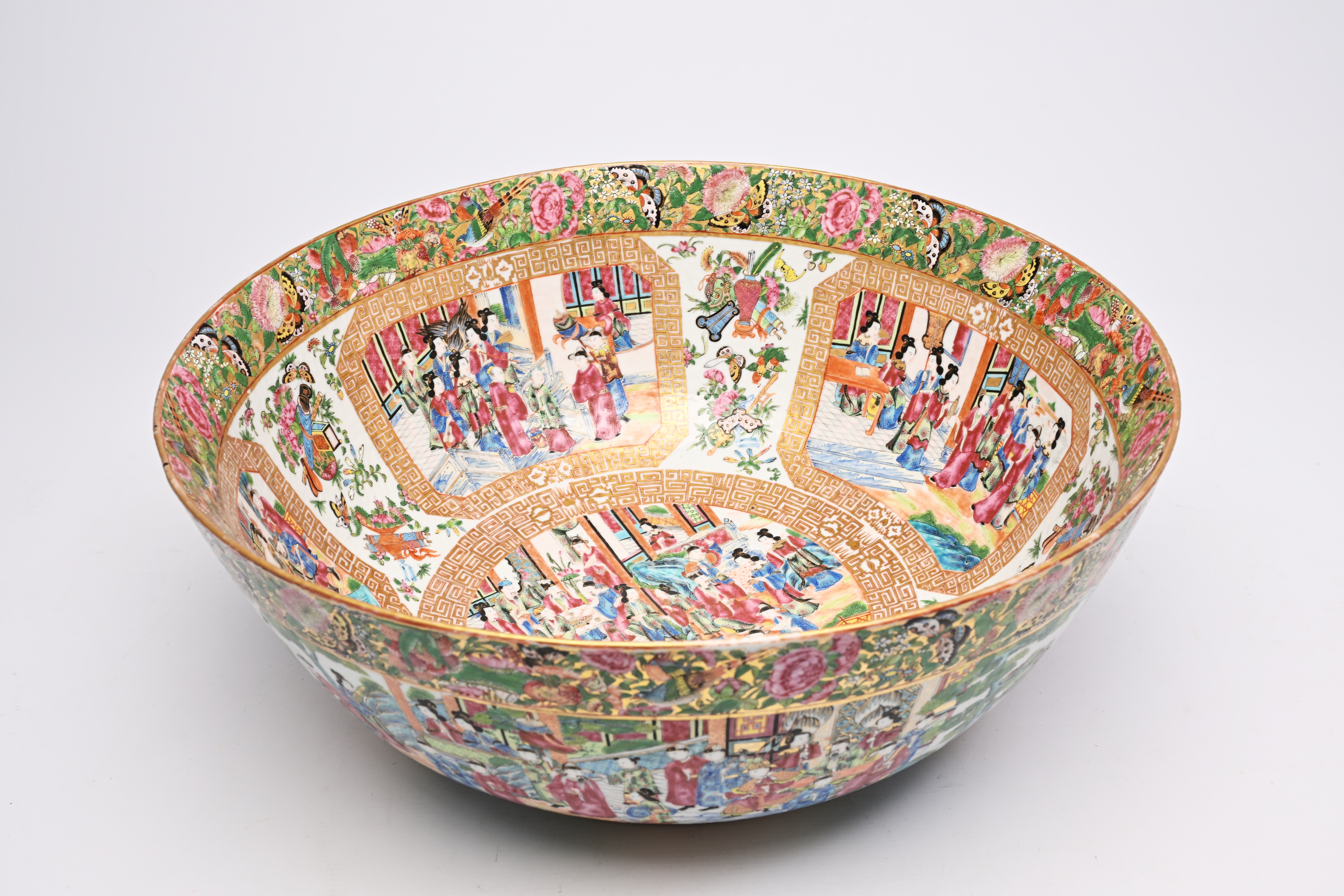 A large Chinese Canton famille rose bowl with floral design and palace scenes, 19th C. - Image 2 of 9
