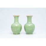 A pair of Chinese celadon-glazed bottle vases, 20th C.