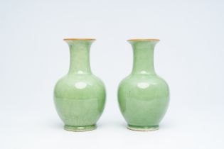 A pair of Chinese celadon-glazed bottle vases, 20th C.