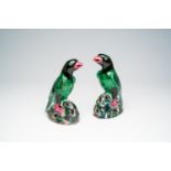 A pair of Chinese polychrome models of parrots, 19th/20th C.