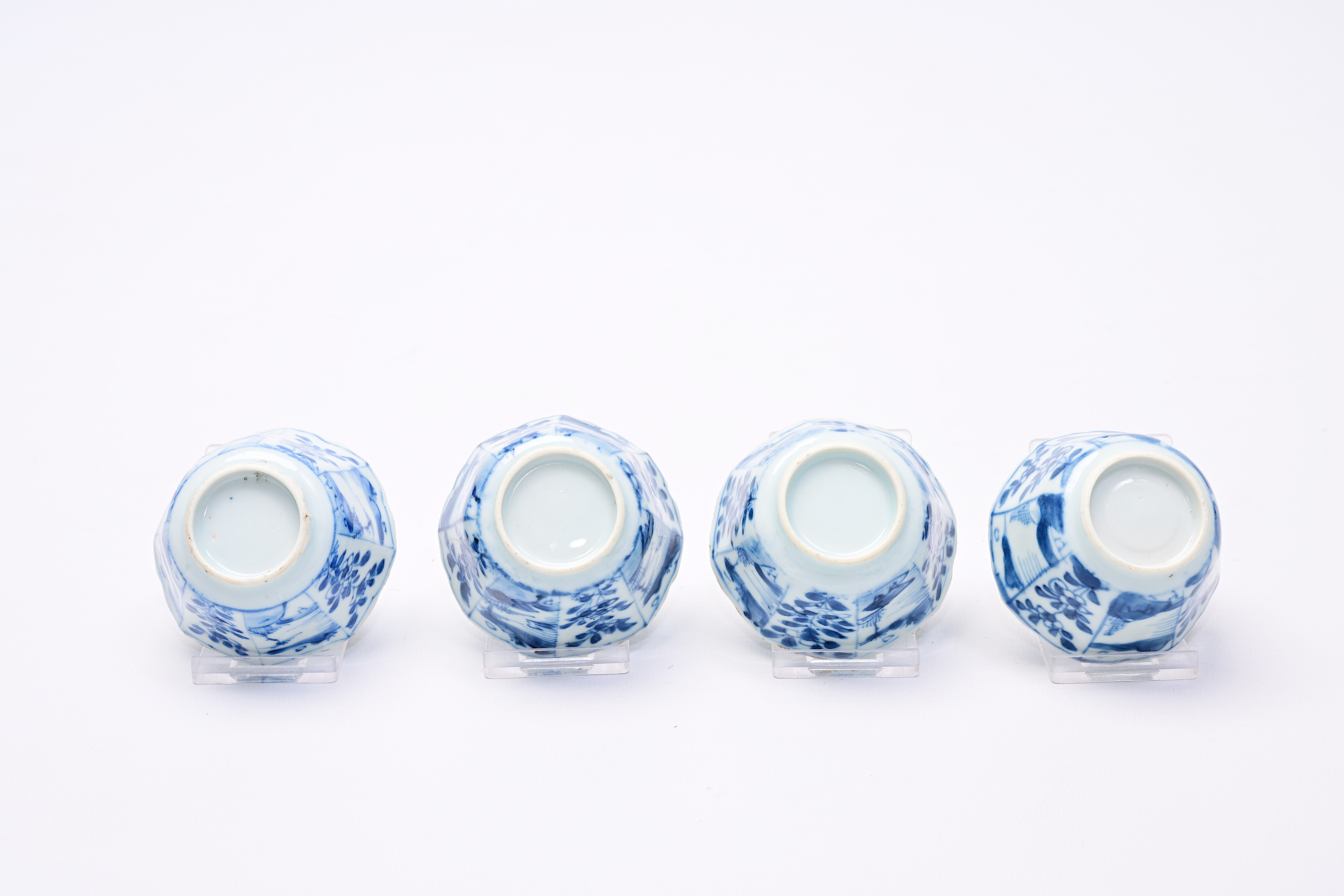 Four Chinese blue and white cups and saucers with floral design and landscapes, Kangxi - Image 7 of 12